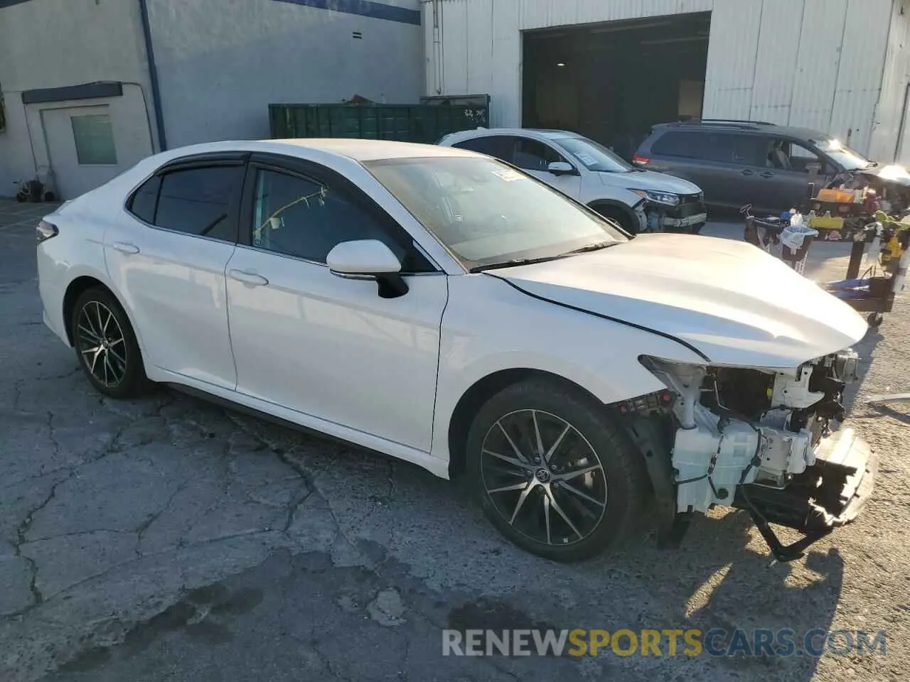 4 Photograph of a damaged car 4T1G11AK2RU869248 TOYOTA CAMRY 2024