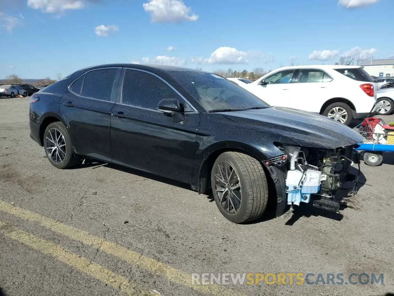 4 Фотография поврежденного автомобиля 4T1G11AK2RU887104 TOYOTA CAMRY 2024
