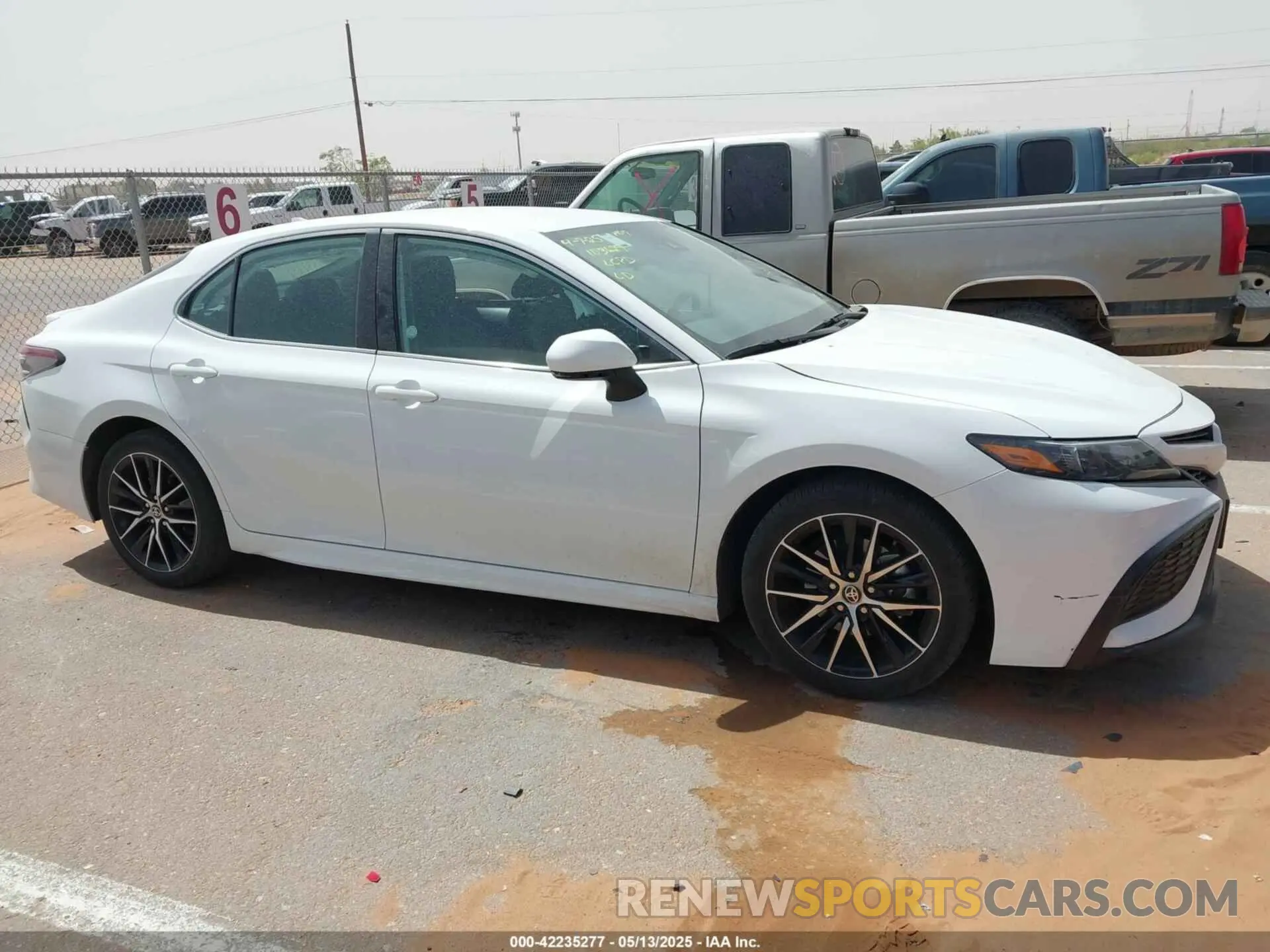13 Photograph of a damaged car 4T1G11AK4RU891817 TOYOTA CAMRY 2024