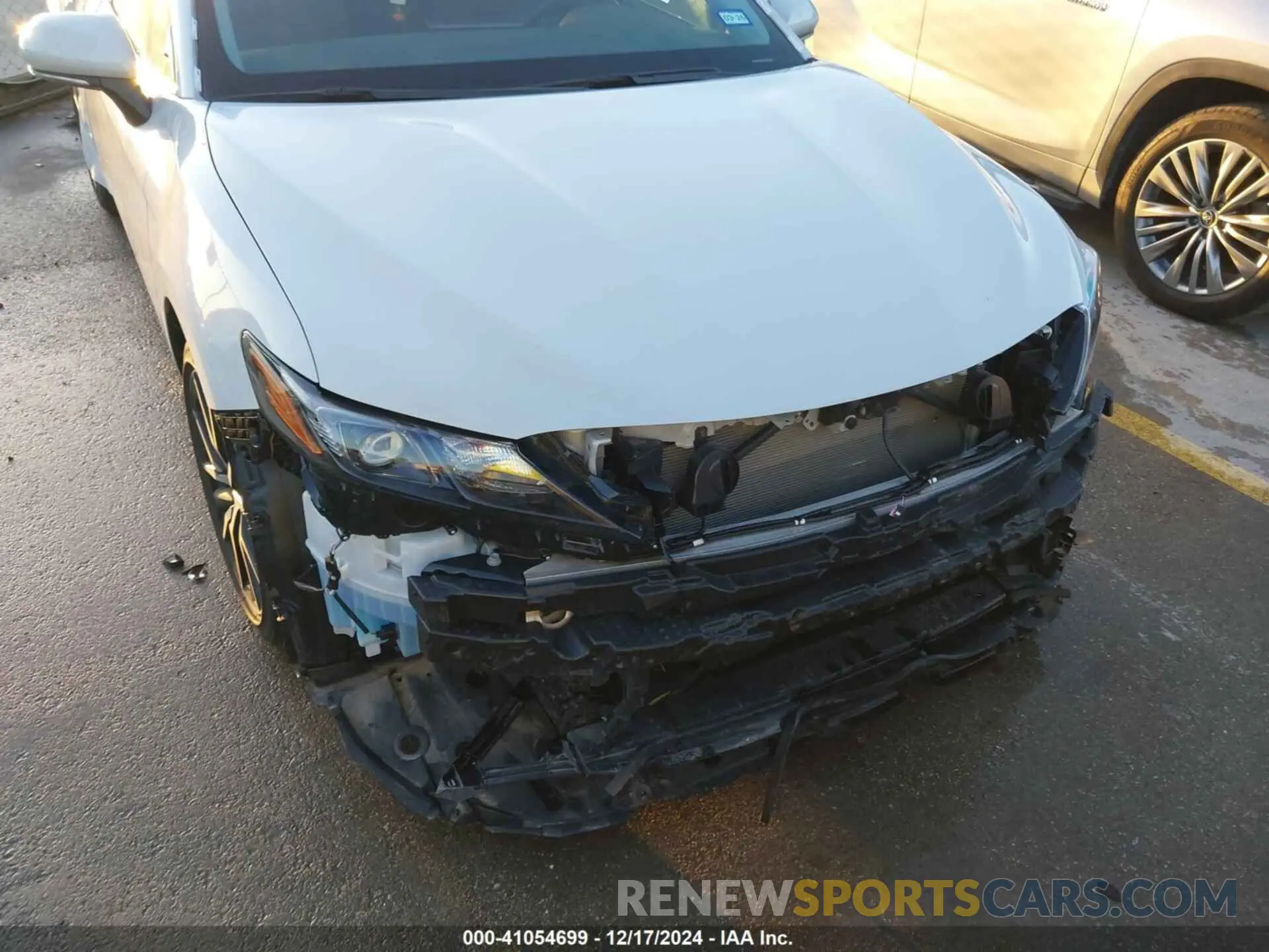 19 Photograph of a damaged car 4T1G11AK5RU208748 TOYOTA CAMRY 2024