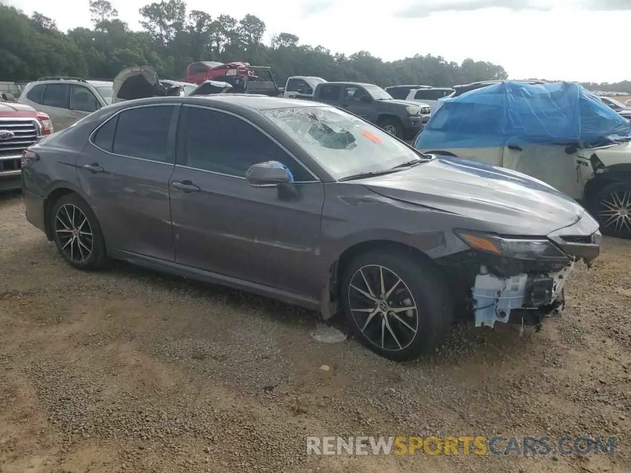 4 Photograph of a damaged car 4T1G11AK5RU852069 TOYOTA CAMRY 2024