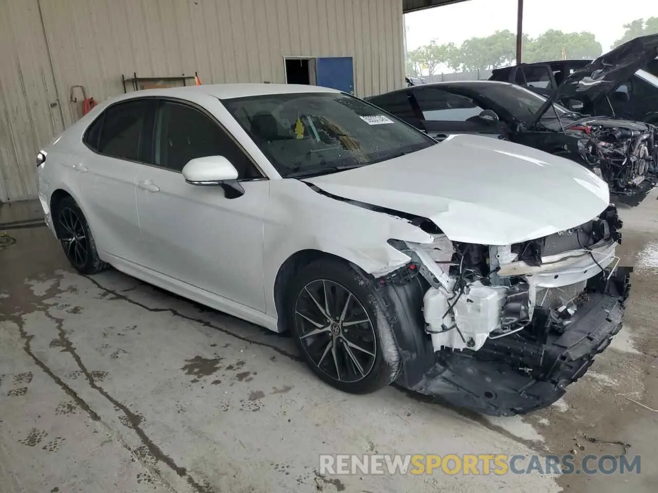 4 Photograph of a damaged car 4T1G11AK6RU851030 TOYOTA CAMRY 2024