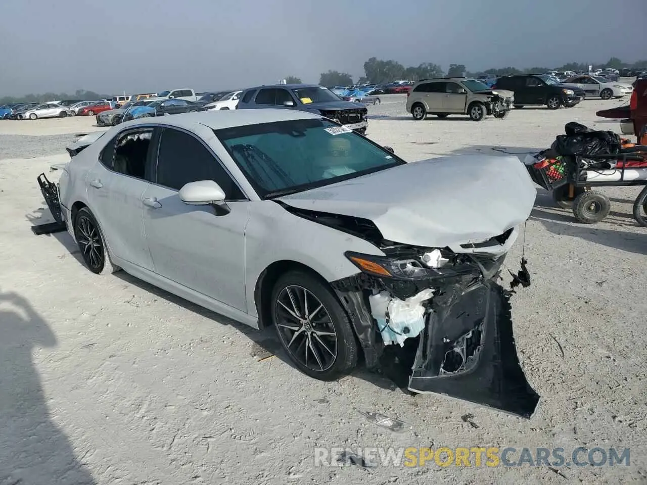 4 Фотография поврежденного автомобиля 4T1G11AK7RU204149 TOYOTA CAMRY 2024
