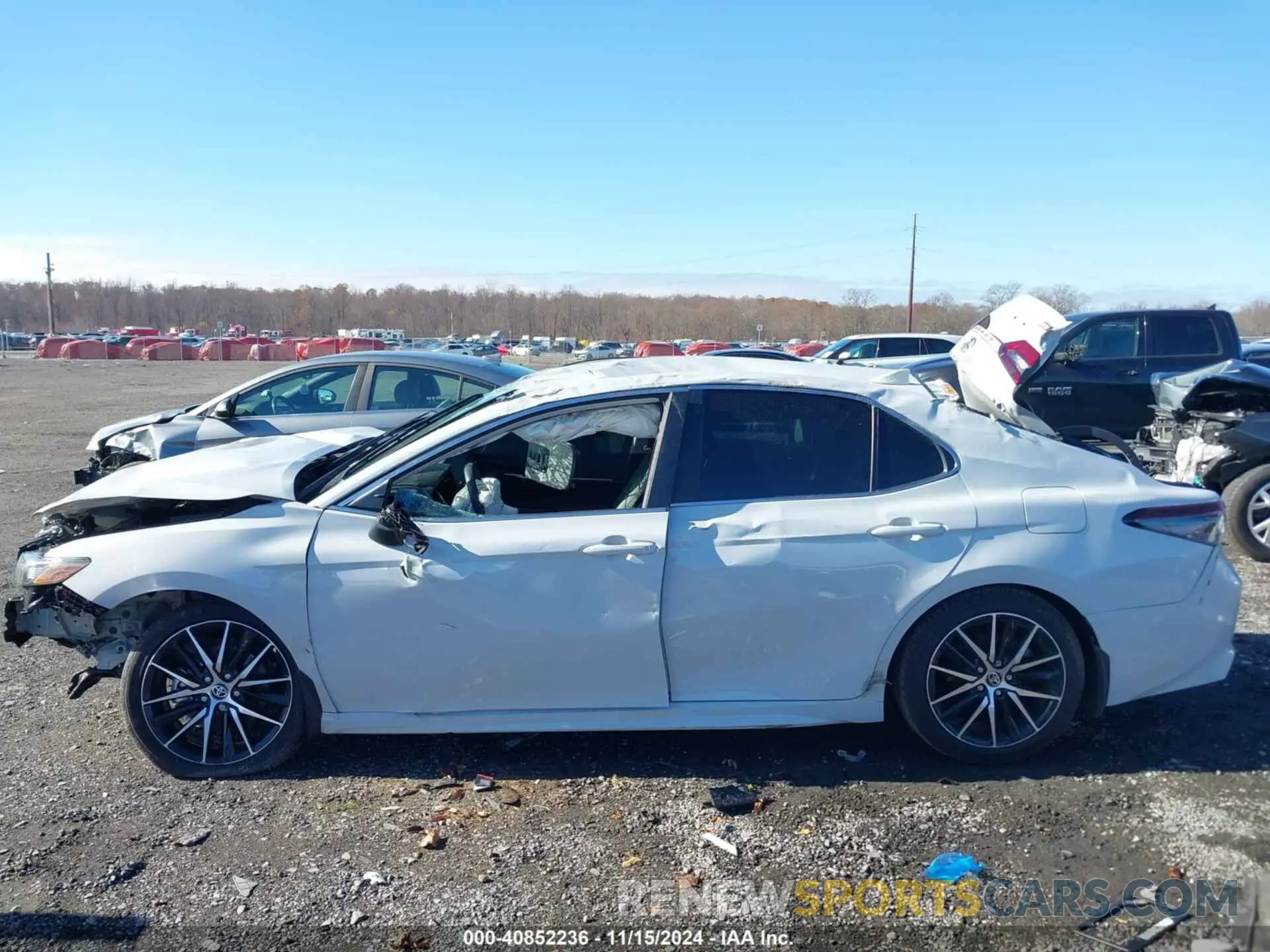 15 Photograph of a damaged car 4T1G11AK7RU216494 TOYOTA CAMRY 2024