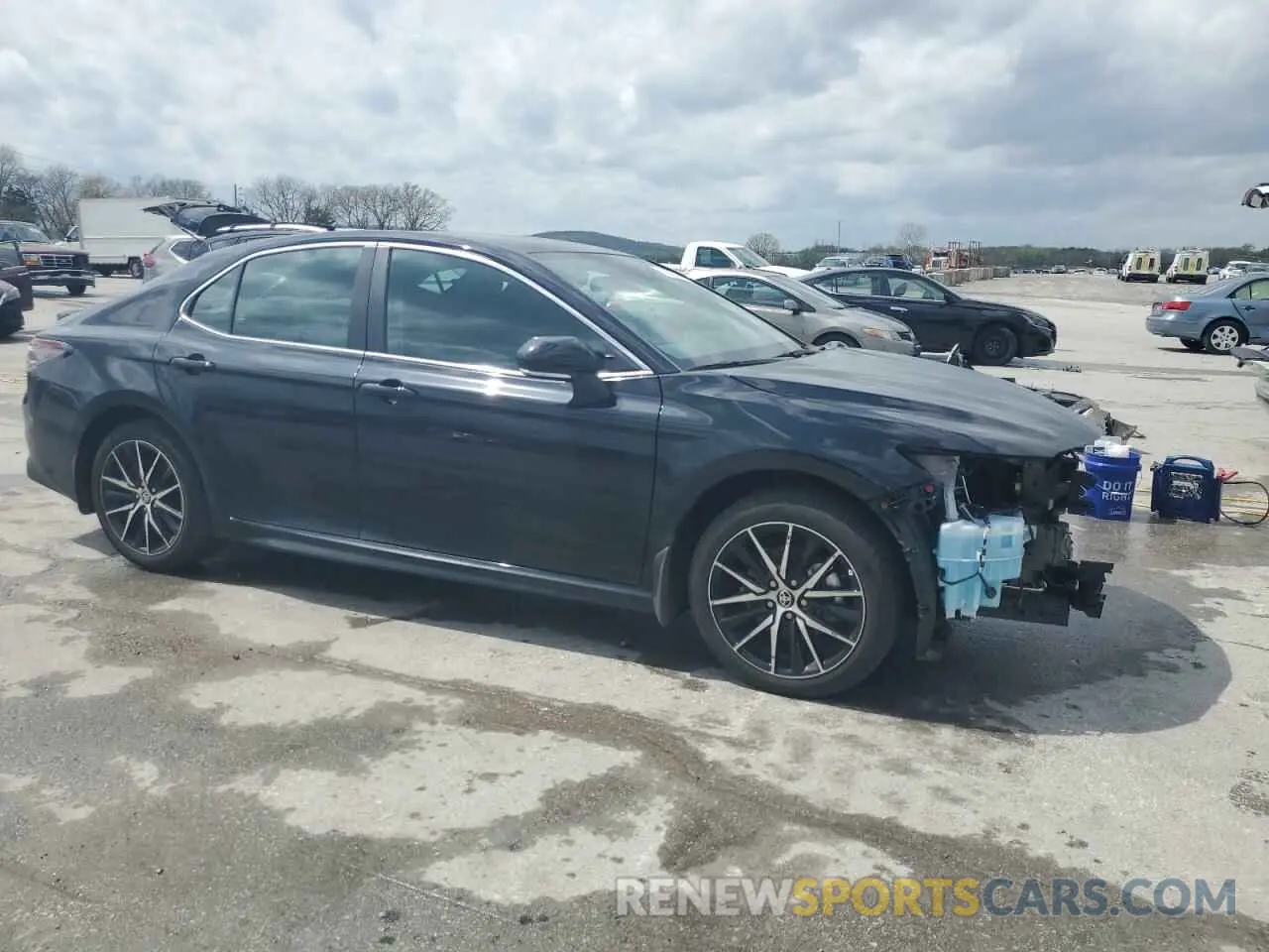 4 Photograph of a damaged car 4T1G11AK7RU233490 TOYOTA CAMRY 2024
