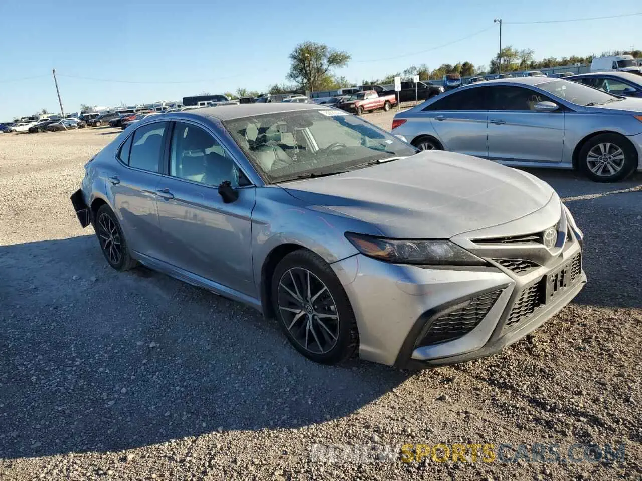4 Photograph of a damaged car 4T1G11AK7RU863543 TOYOTA CAMRY 2024