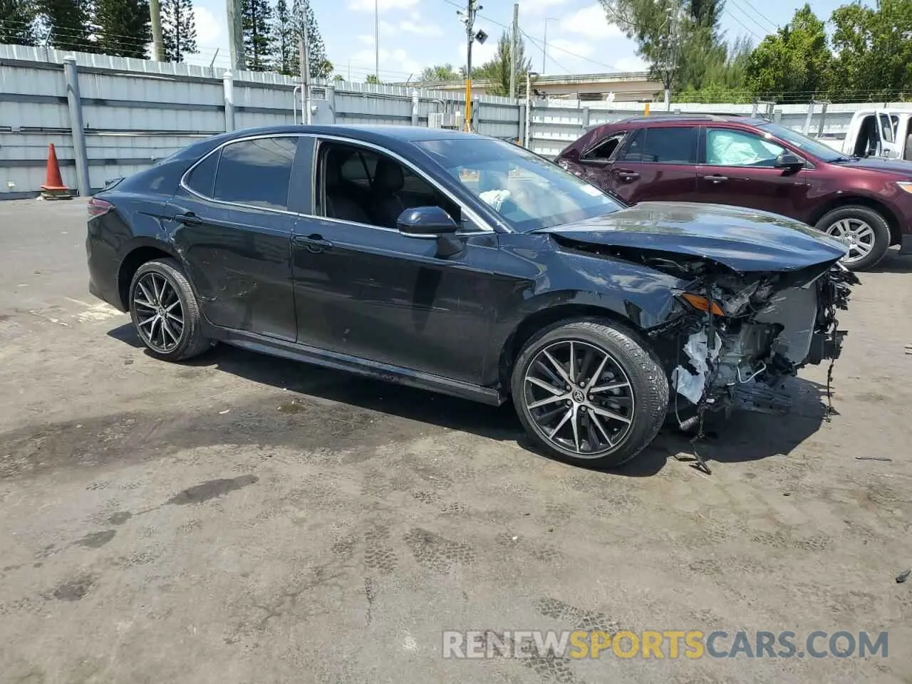 4 Photograph of a damaged car 4T1G11AK8RU202958 TOYOTA CAMRY 2024