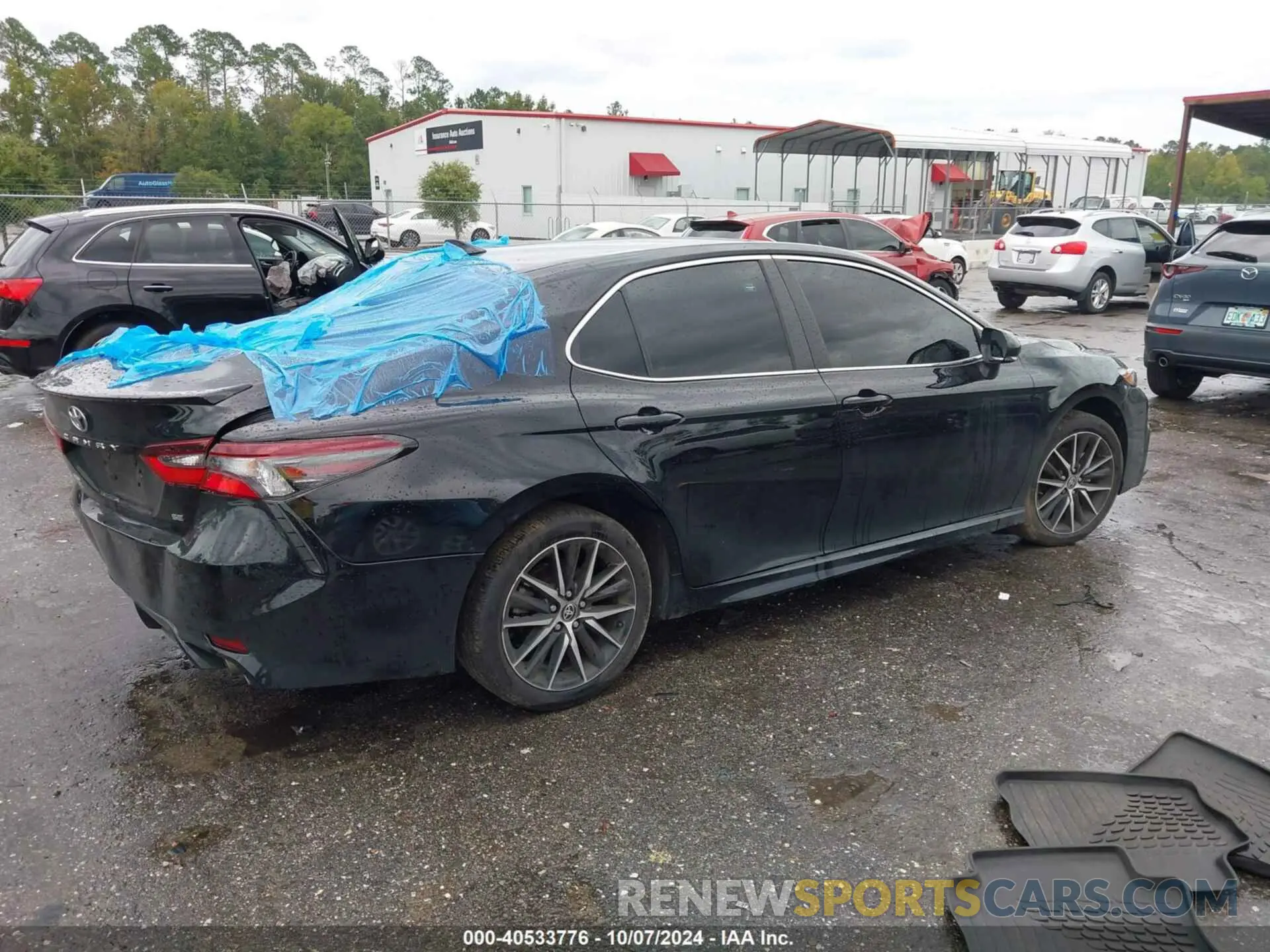 4 Photograph of a damaged car 4T1G11AKXRU887643 TOYOTA CAMRY 2024