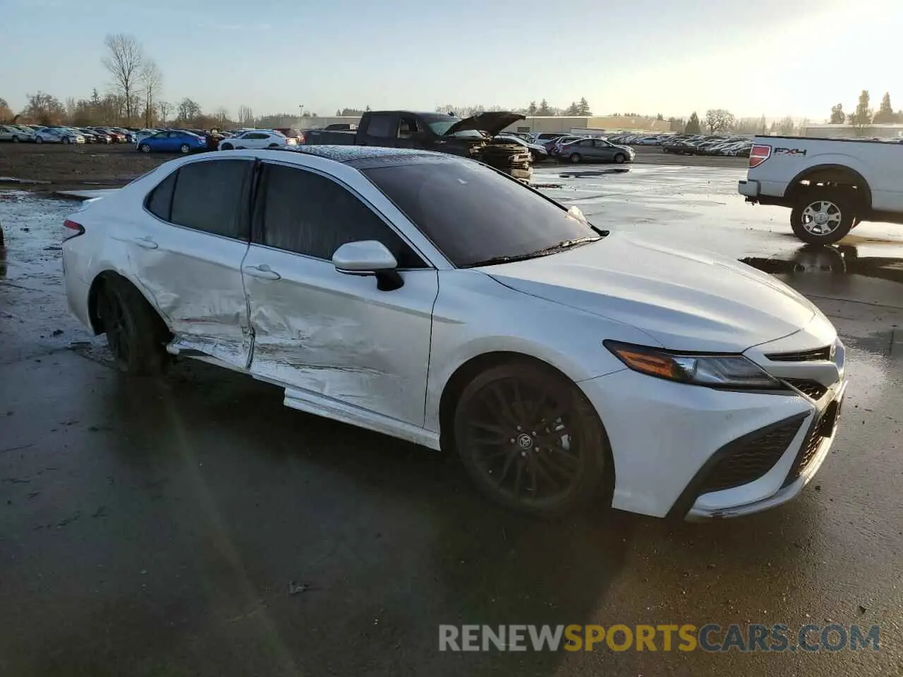 4 Photograph of a damaged car 4T1KZ1AK3RU093215 TOYOTA CAMRY 2024