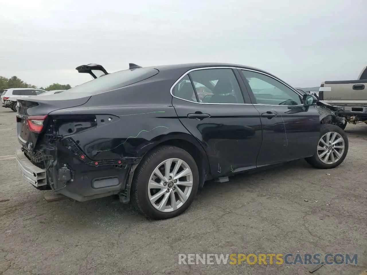 3 Photograph of a damaged car 4T1R11AK4RU874248 TOYOTA CAMRY 2024