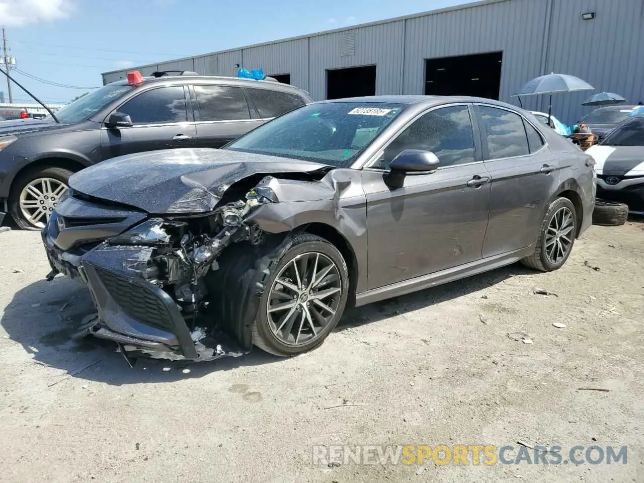 1 Photograph of a damaged car 4T1S11AK0RU212328 TOYOTA CAMRY 2024