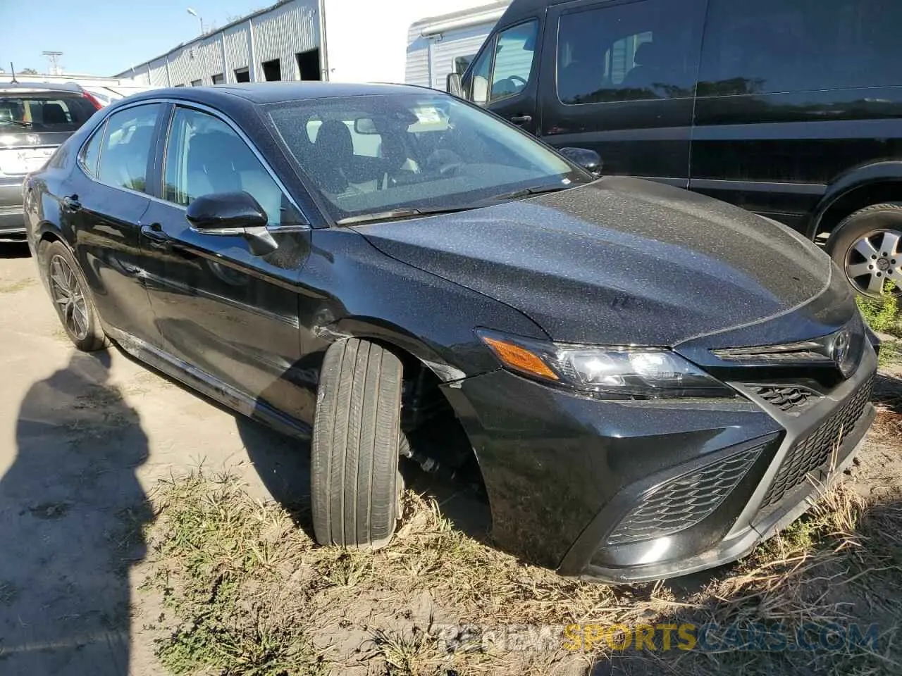 4 Photograph of a damaged car 4T1S11AK8RU907592 TOYOTA CAMRY 2024