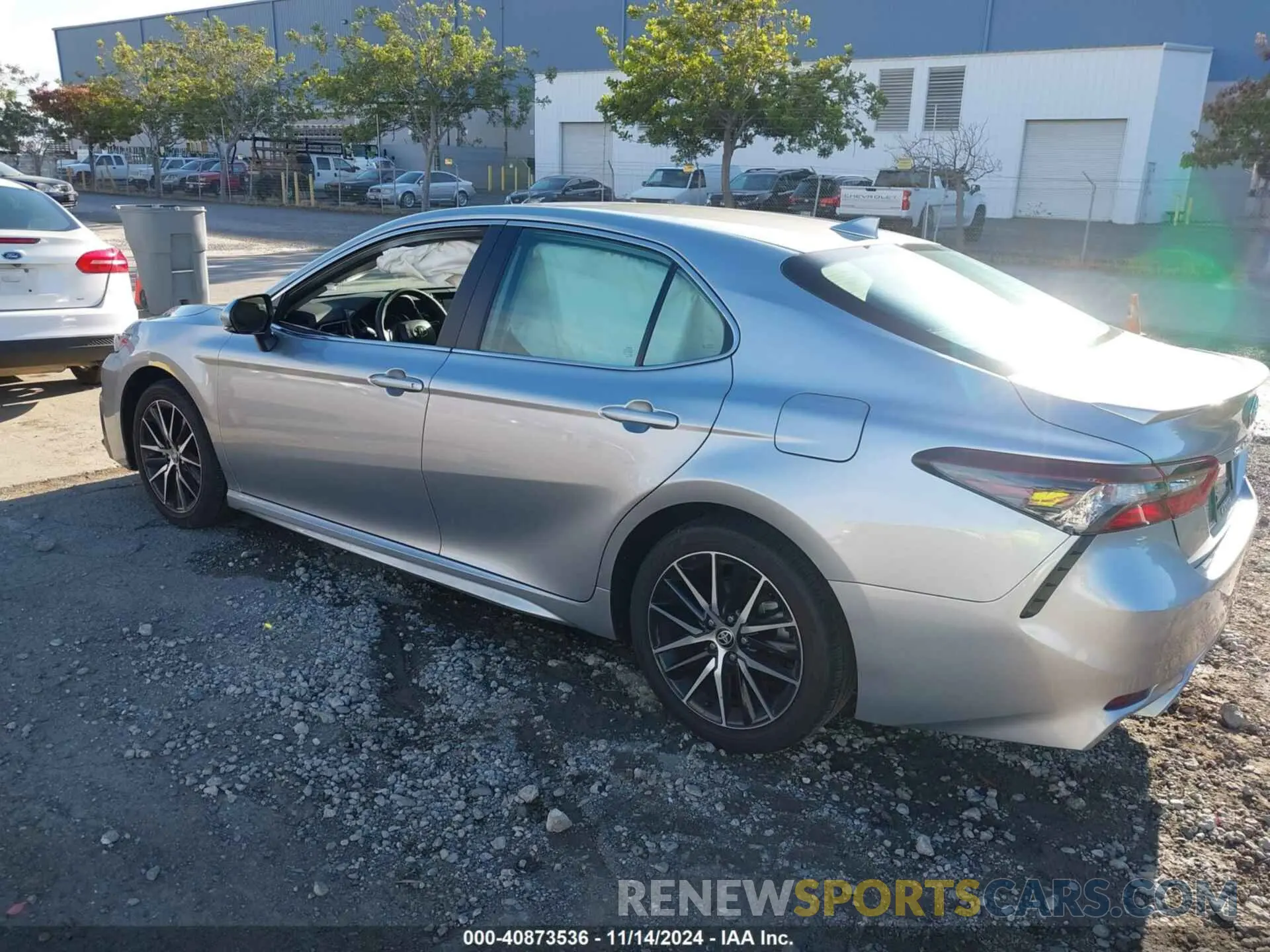 3 Photograph of a damaged car 4T1T11AK7RU864691 TOYOTA CAMRY 2024
