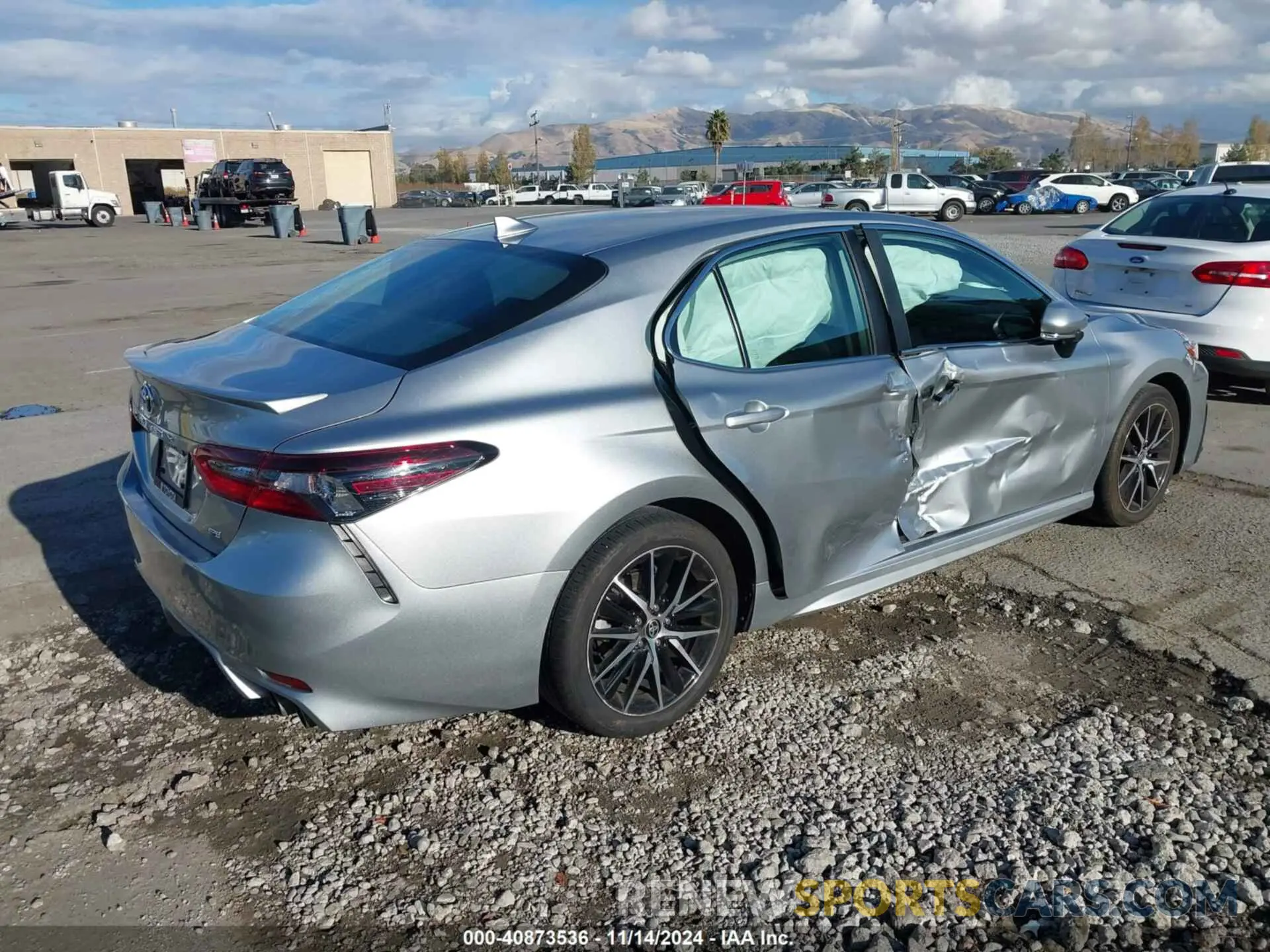 4 Photograph of a damaged car 4T1T11AK7RU864691 TOYOTA CAMRY 2024