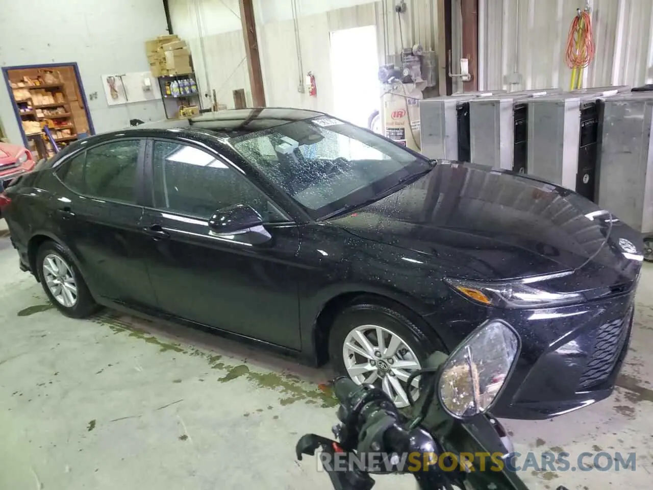 4 Photograph of a damaged car 4T1DBADK0SU527833 TOYOTA CAMRY 2025