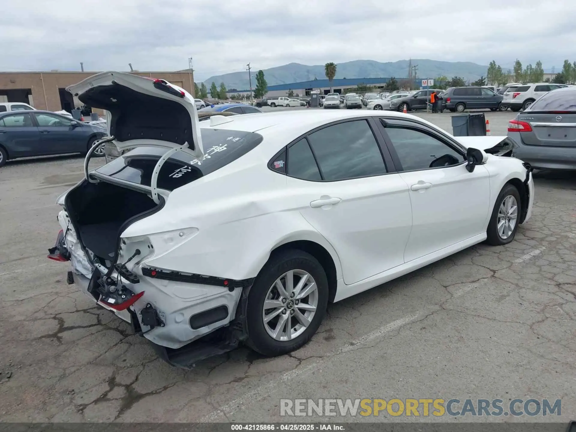 4 Photograph of a damaged car 4T1DBADK6SU002775 TOYOTA CAMRY 2025