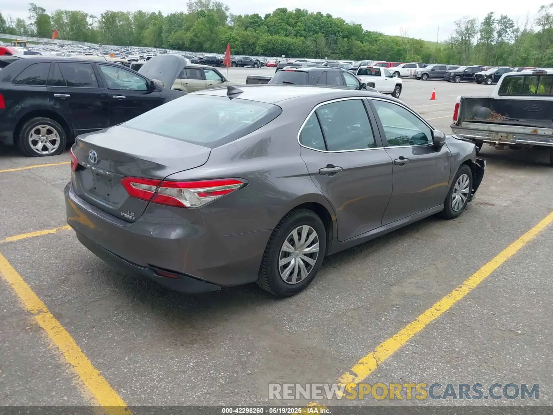 4 Photograph of a damaged car 4T1B31HK4KU511360 TOYOTA CAMRY HYBRID 2019