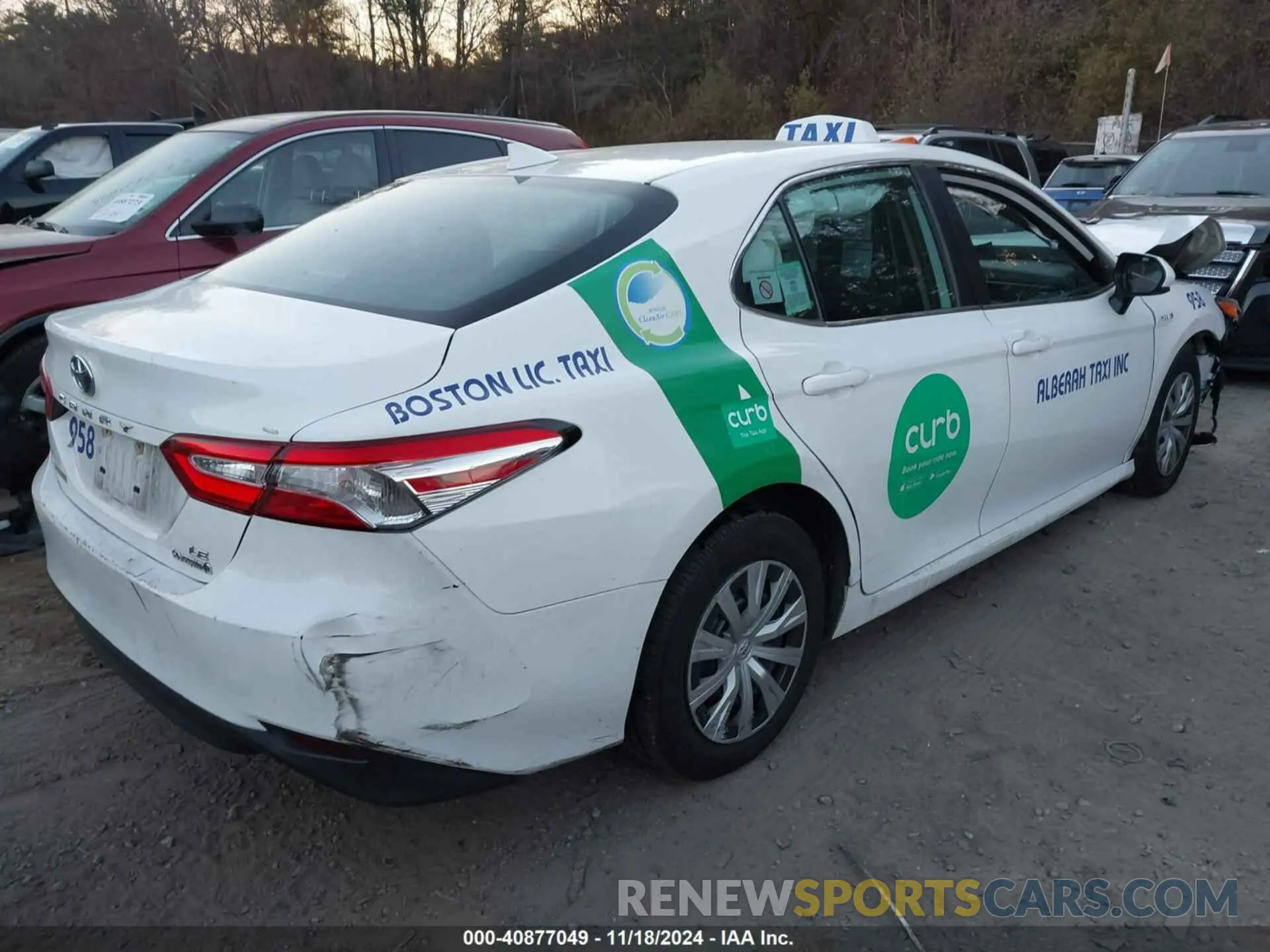 4 Photograph of a damaged car 4T1B31HK7KU510090 TOYOTA CAMRY HYBRID 2019