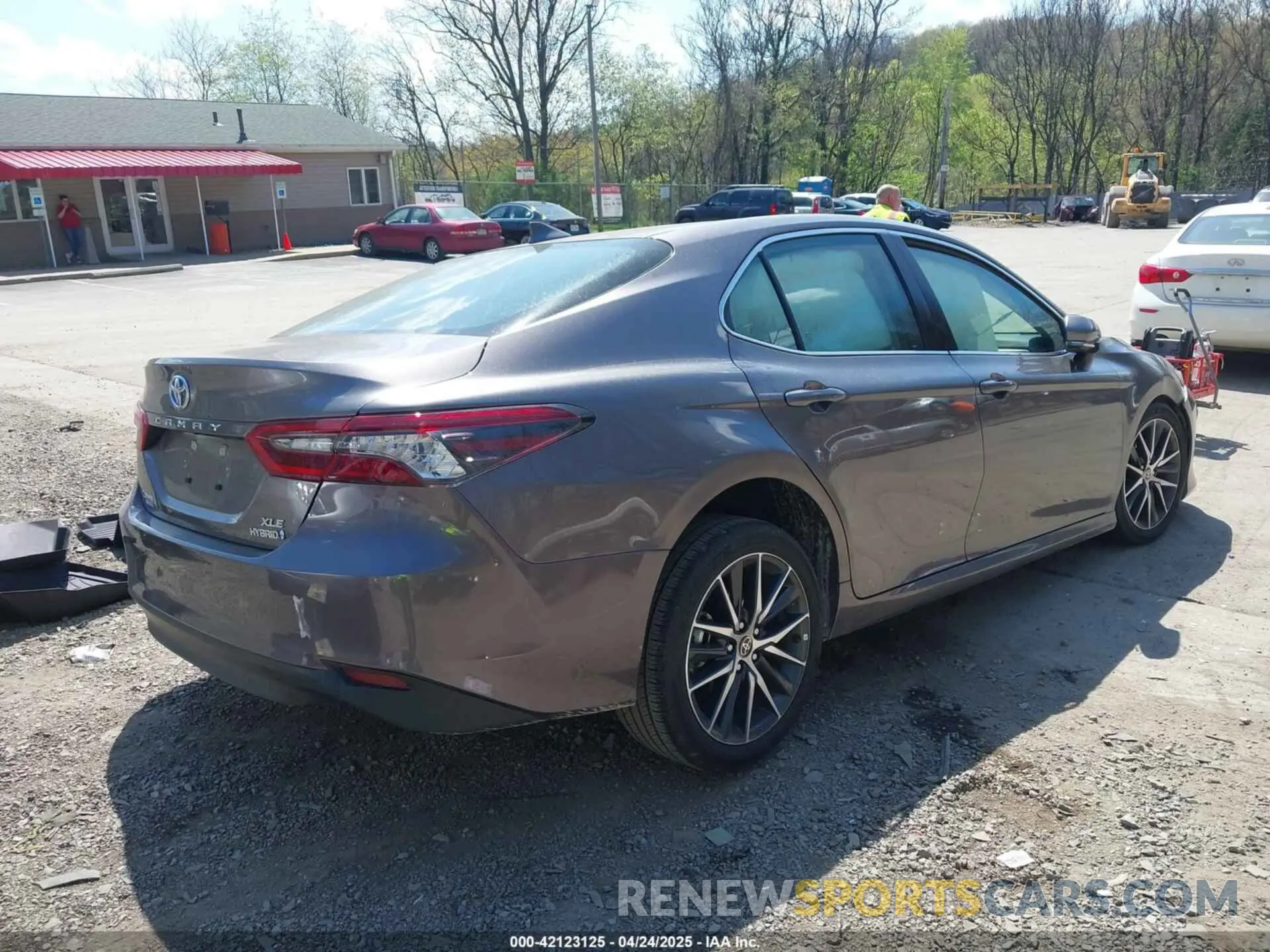 4 Photograph of a damaged car 4T1F31AK9RU071027 TOYOTA CAMRY HYBRID 2024