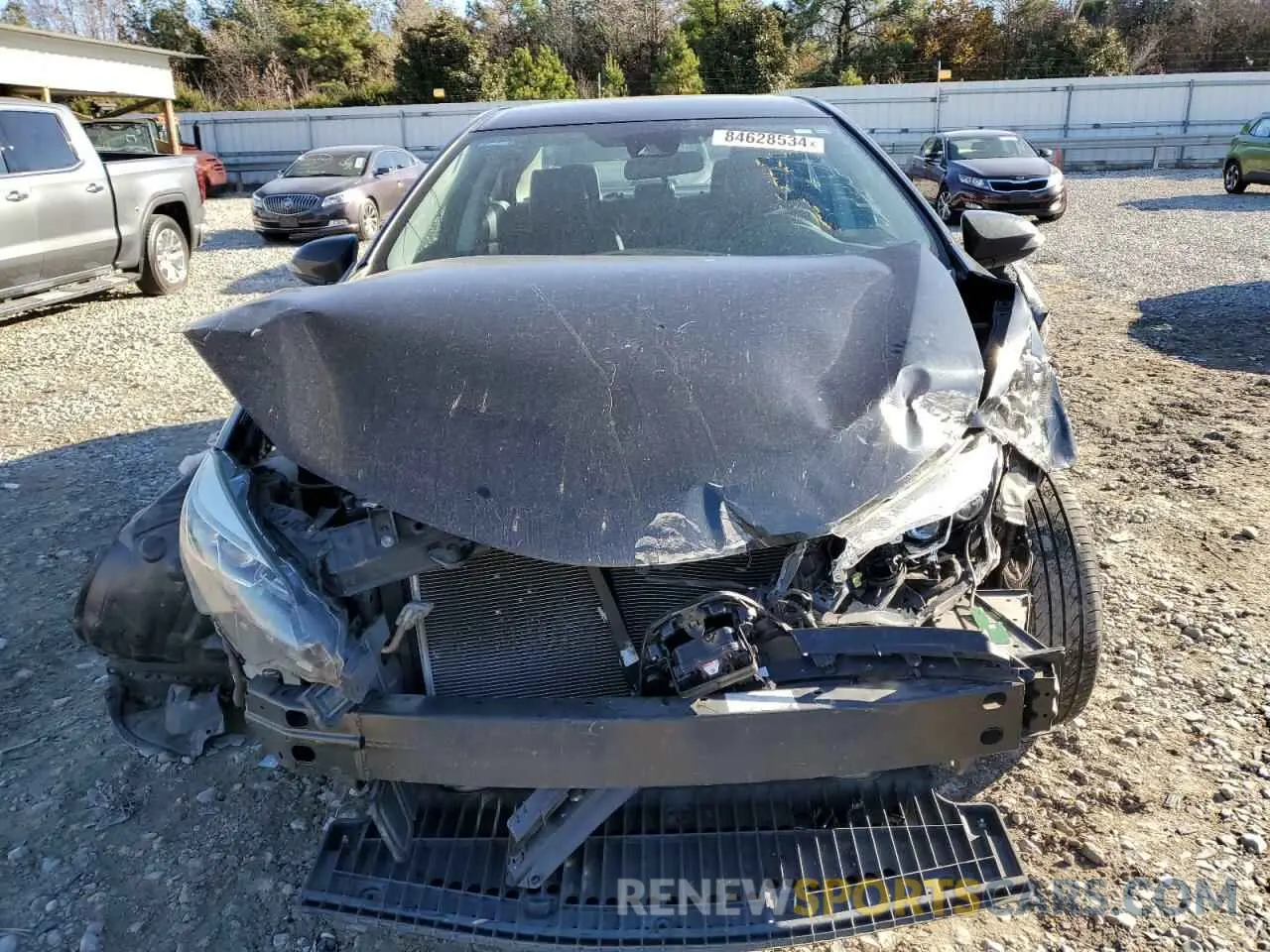 5 Photograph of a damaged car 5YFBURHE0KP879476 TOYOTA COROLLA 2019