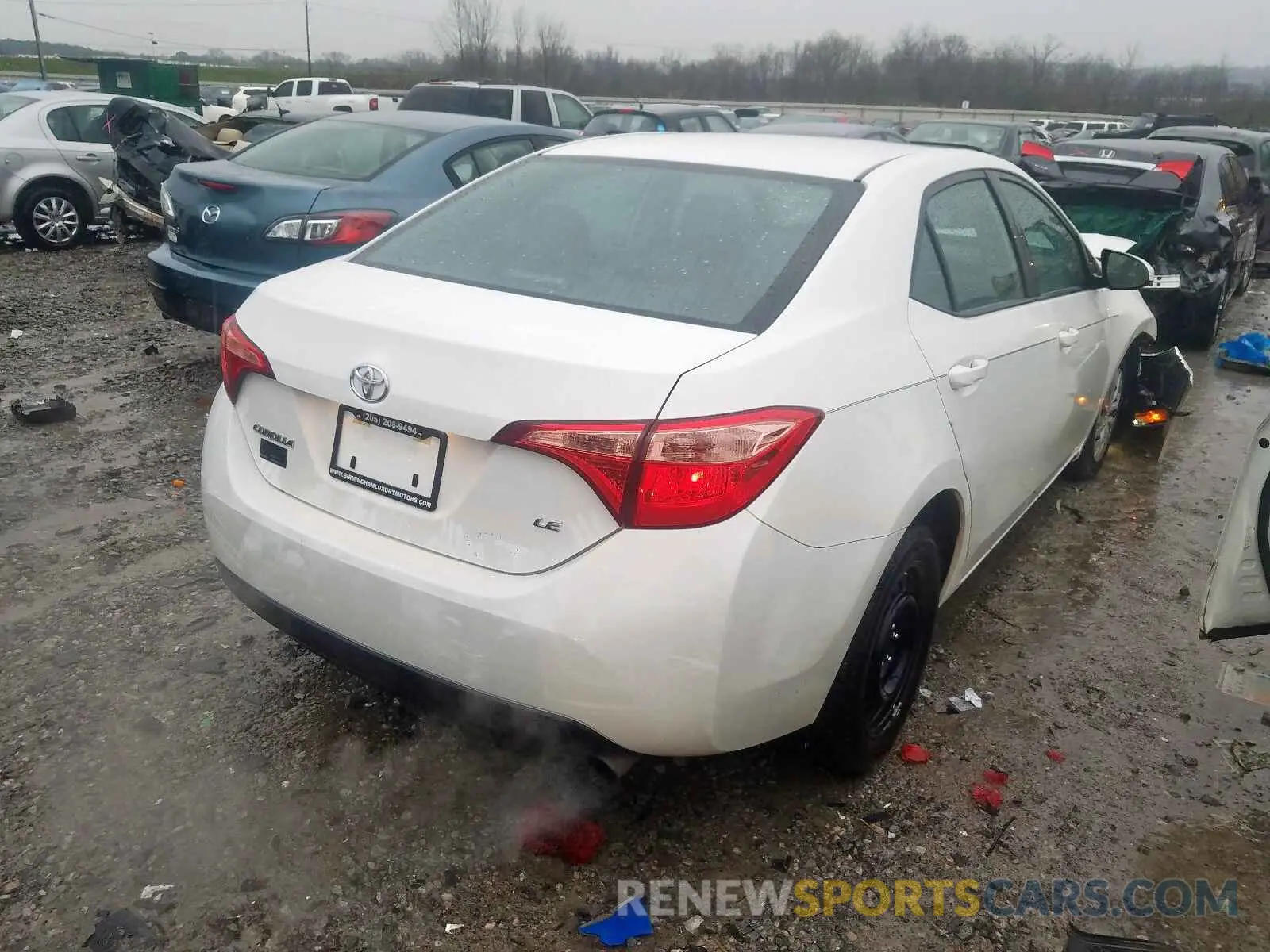 4 Photograph of a damaged car 5YFBURHE1KP883004 TOYOTA COROLLA 2019