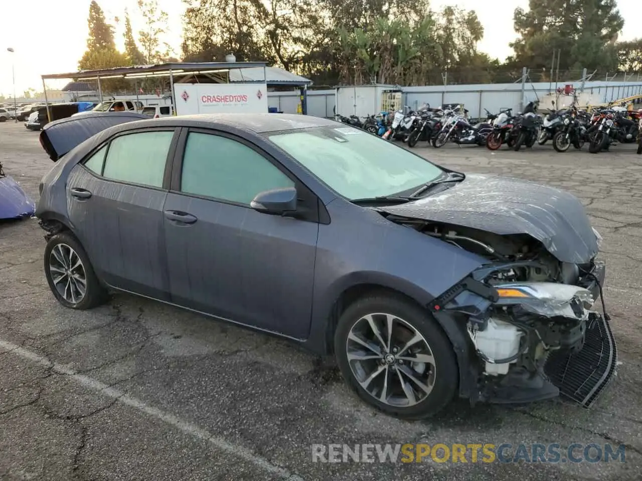 4 Photograph of a damaged car 5YFBURHE1KP896531 TOYOTA COROLLA 2019