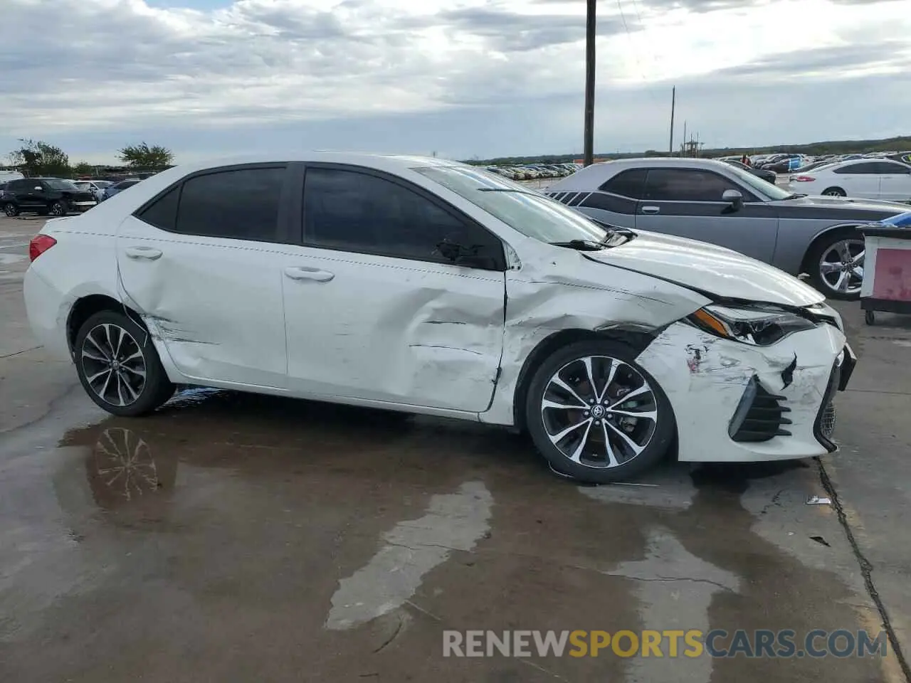 4 Photograph of a damaged car 5YFBURHE1KP897873 TOYOTA COROLLA 2019