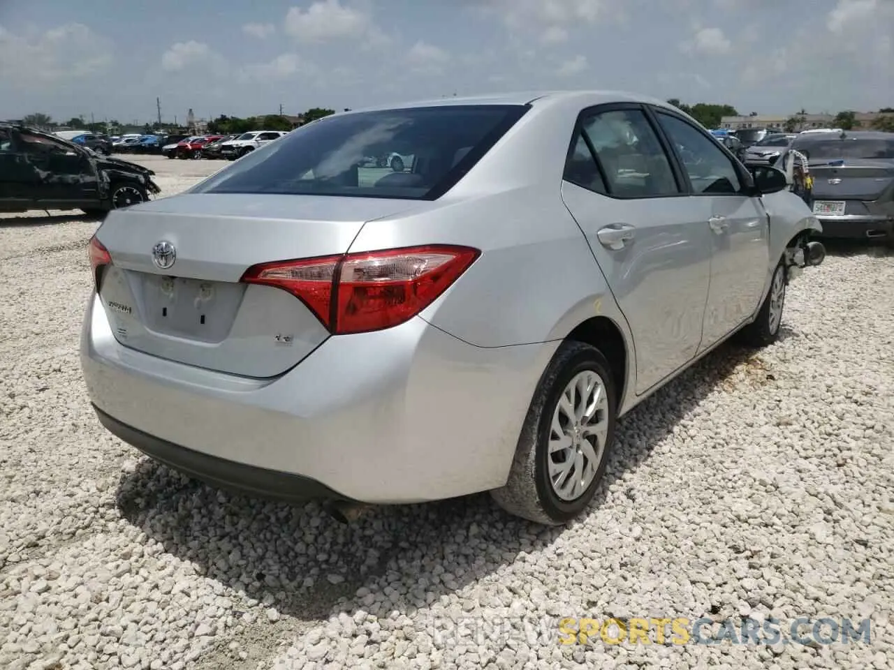 4 Photograph of a damaged car 5YFBURHE1KP936980 TOYOTA COROLLA 2019