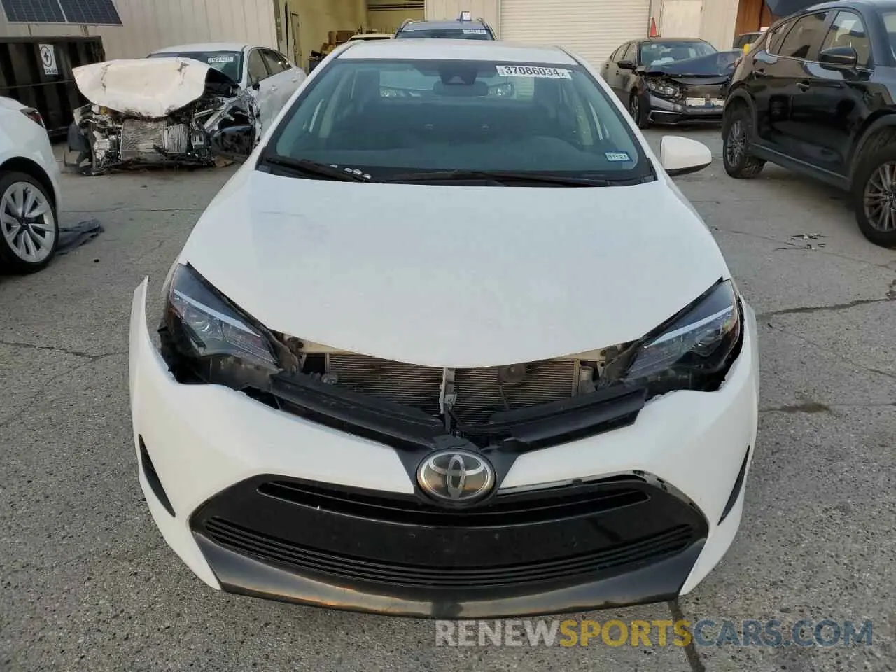 5 Photograph of a damaged car 5YFBURHE2KP939872 TOYOTA COROLLA 2019