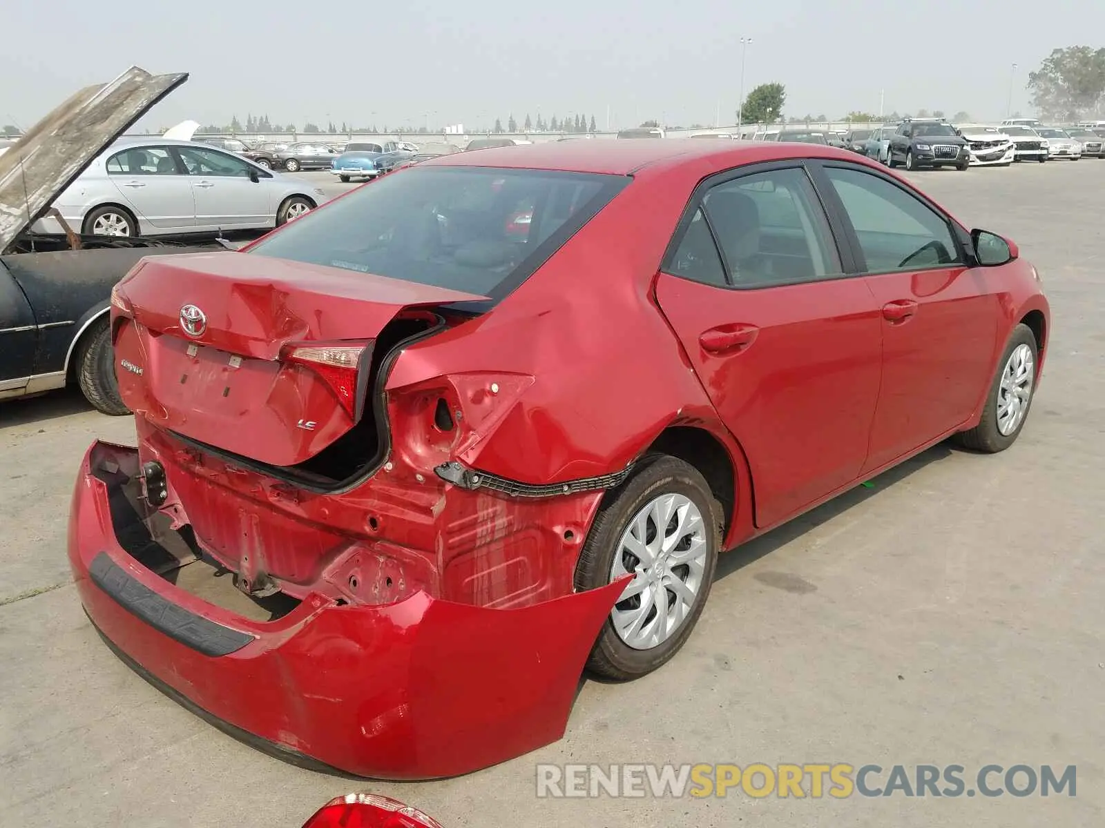 4 Photograph of a damaged car 5YFBURHE3KP875955 TOYOTA COROLLA 2019
