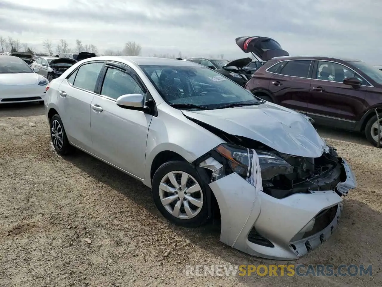 4 Photograph of a damaged car 5YFBURHE3KP887717 TOYOTA COROLLA 2019