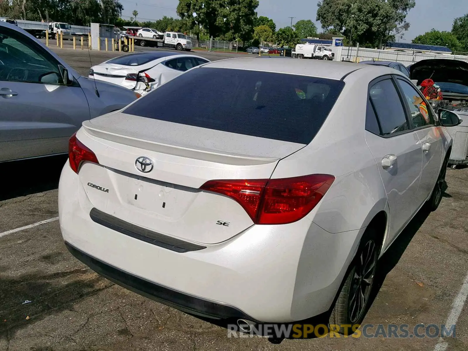 4 Photograph of a damaged car 5YFBURHE4KP895874 TOYOTA COROLLA 2019
