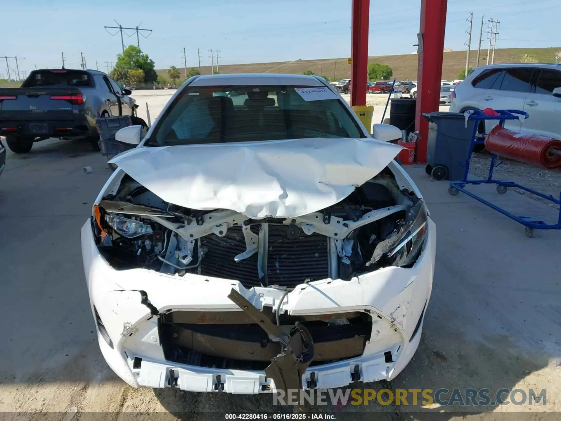 12 Photograph of a damaged car 5YFBURHE5KP945830 TOYOTA COROLLA 2019