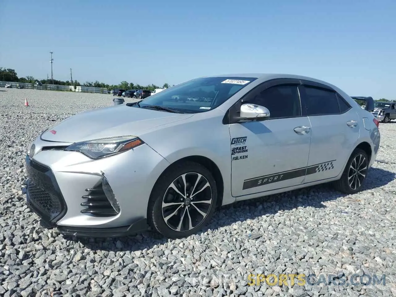 1 Фотография поврежденного автомобиля 5YFBURHE8KP874123 TOYOTA COROLLA 2019