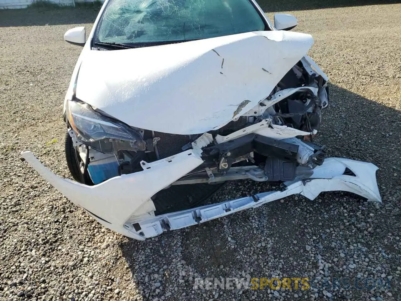 11 Photograph of a damaged car 5YFBURHE9KP859856 TOYOTA COROLLA 2019