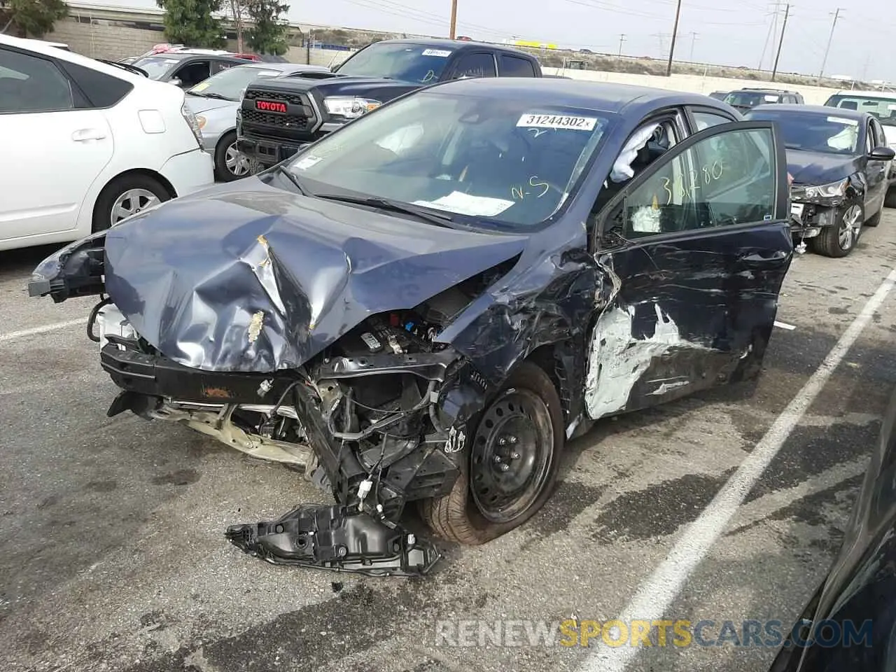 2 Photograph of a damaged car 5YFBURHE9KP904004 TOYOTA COROLLA 2019