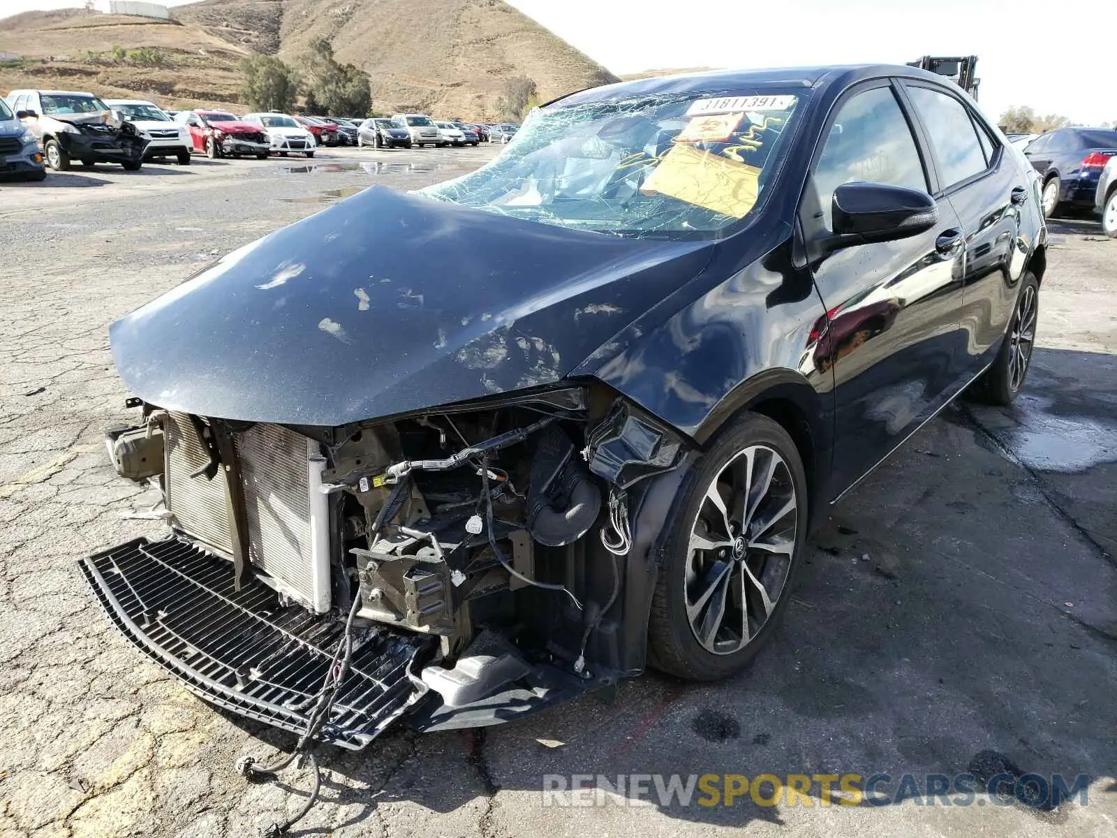 2 Photograph of a damaged car 5YFBURHEXKP899296 TOYOTA COROLLA 2019