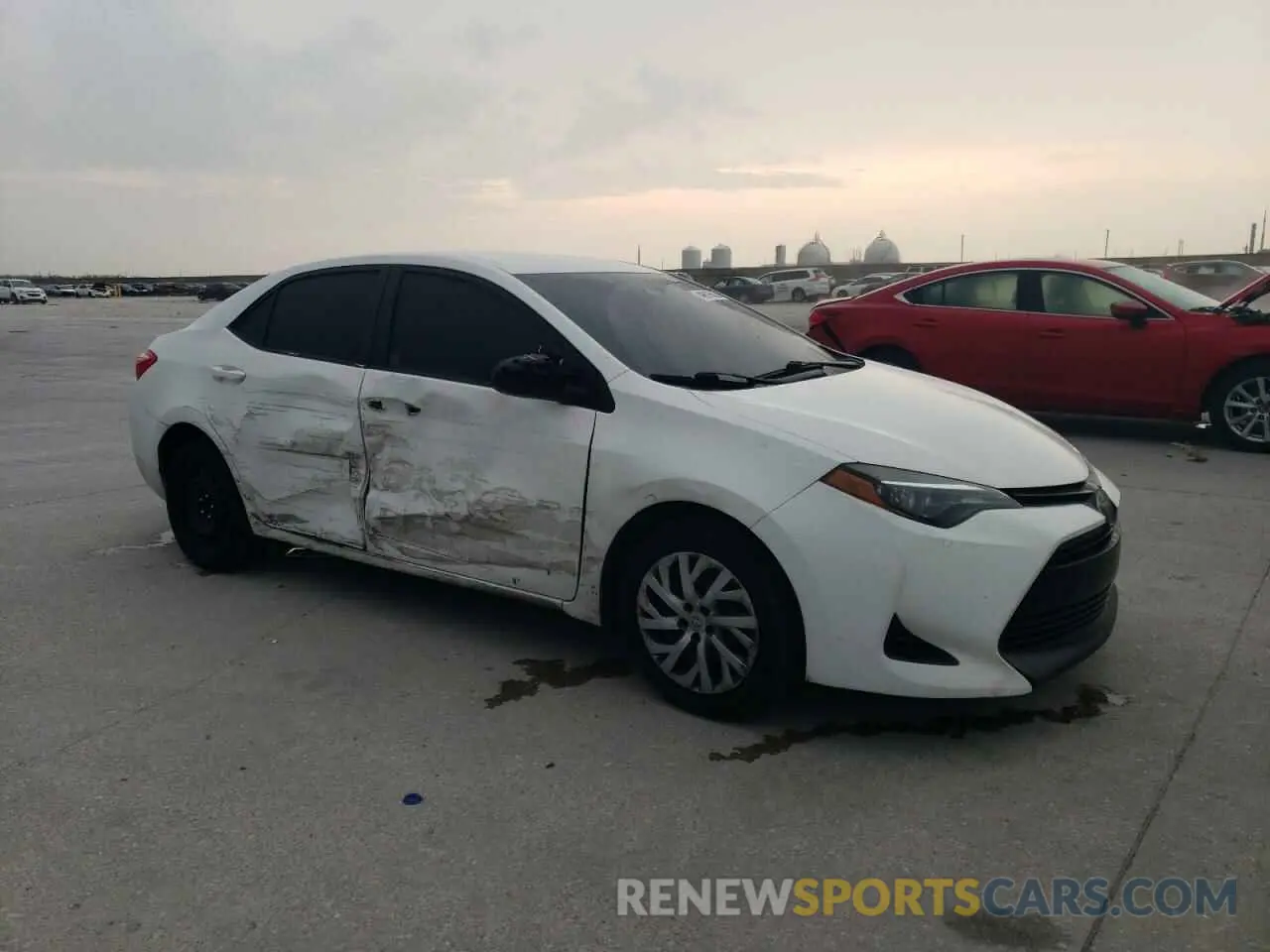 4 Photograph of a damaged car 5YFBURHEXKP902553 TOYOTA COROLLA 2019