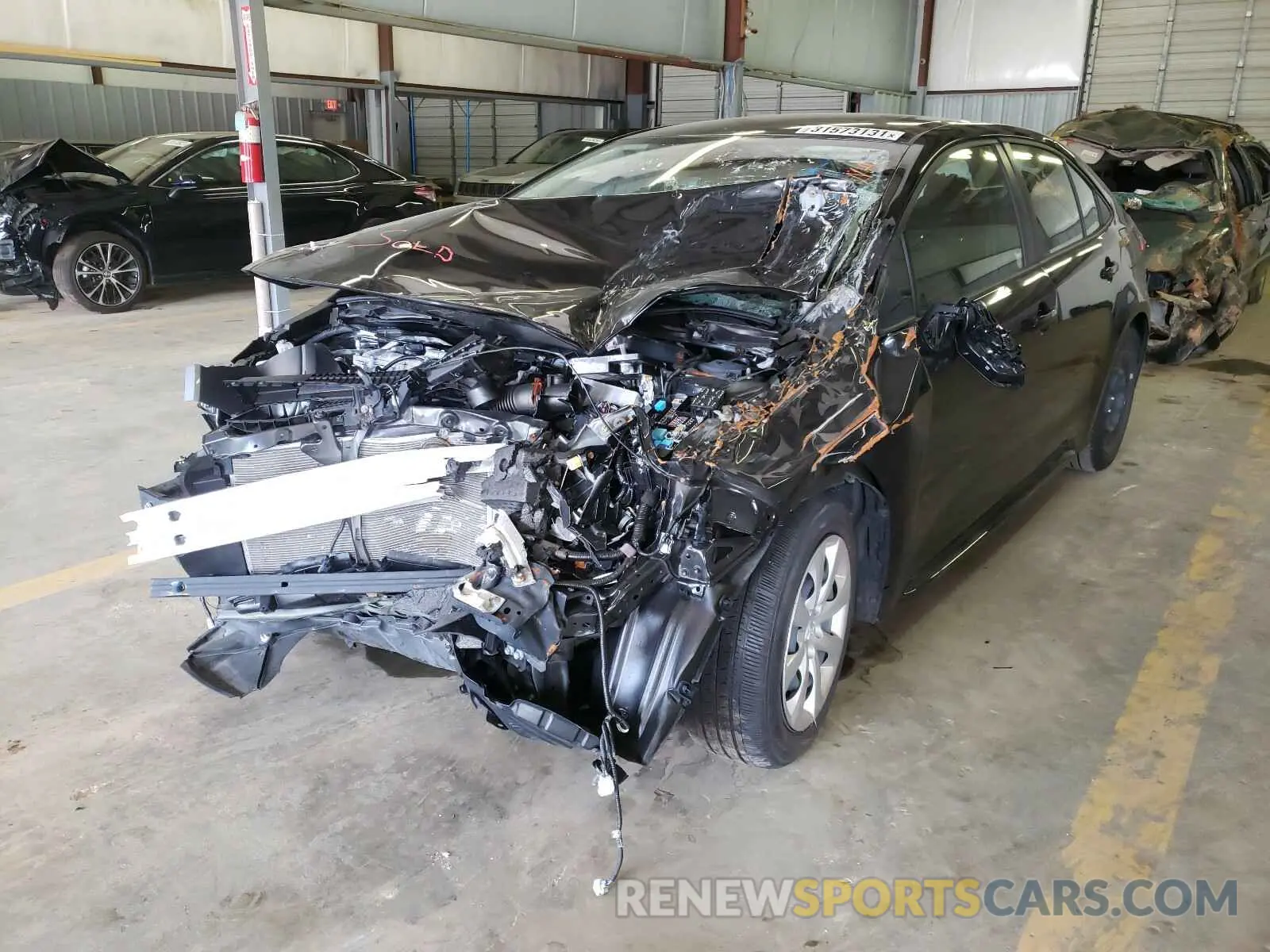 2 Photograph of a damaged car JTDEPRAE5LJ094052 TOYOTA COROLLA 2020