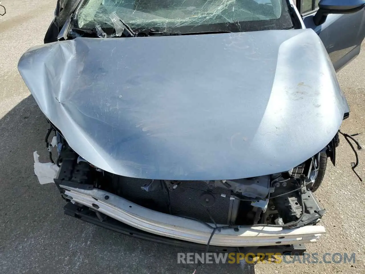 11 Photograph of a damaged car 5YFBPMBE5NP380101 TOYOTA COROLLA 2022