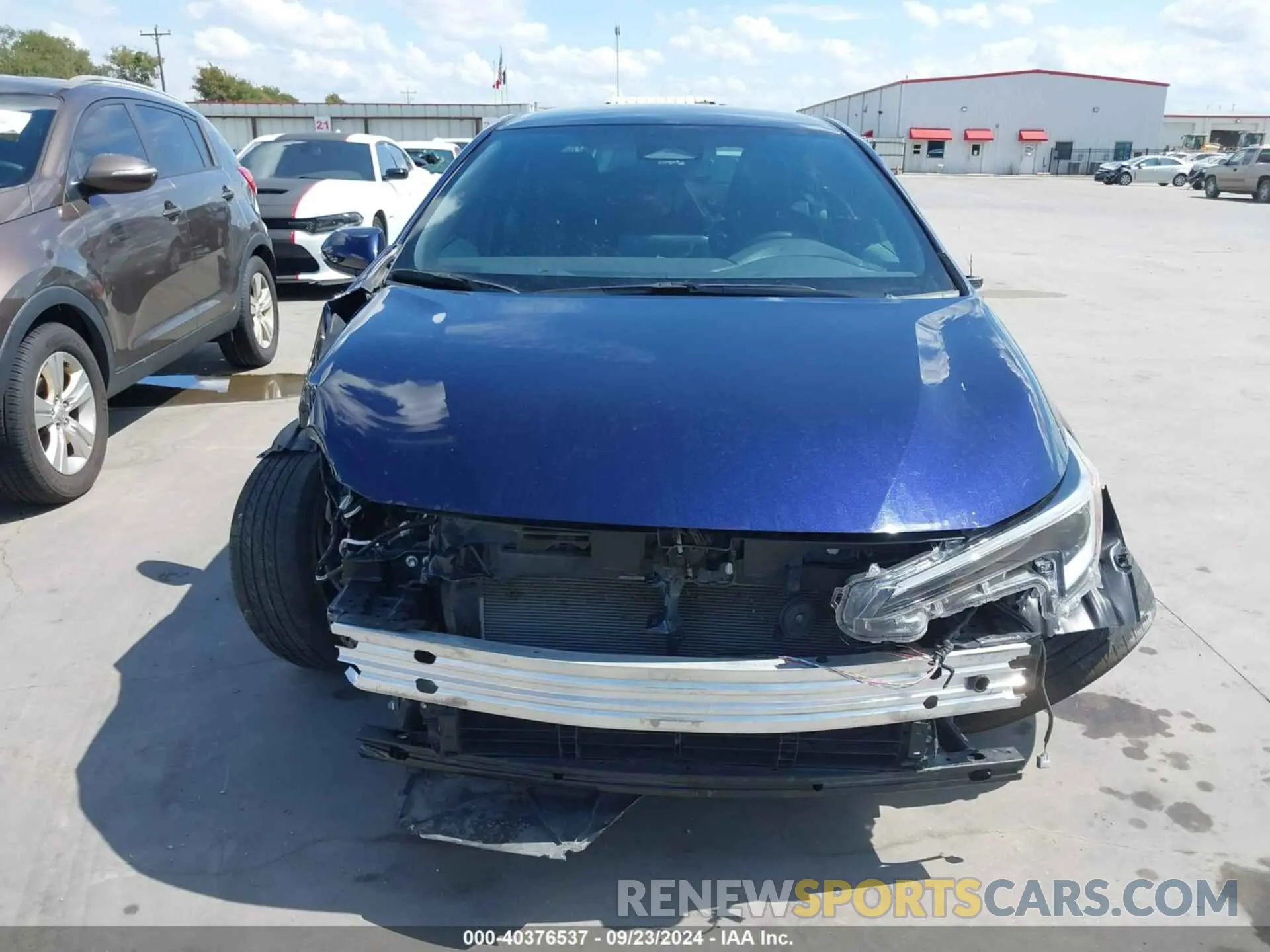 13 Фотография поврежденного автомобиля JTDBCMFE2PJ003920 TOYOTA COROLLA 2023