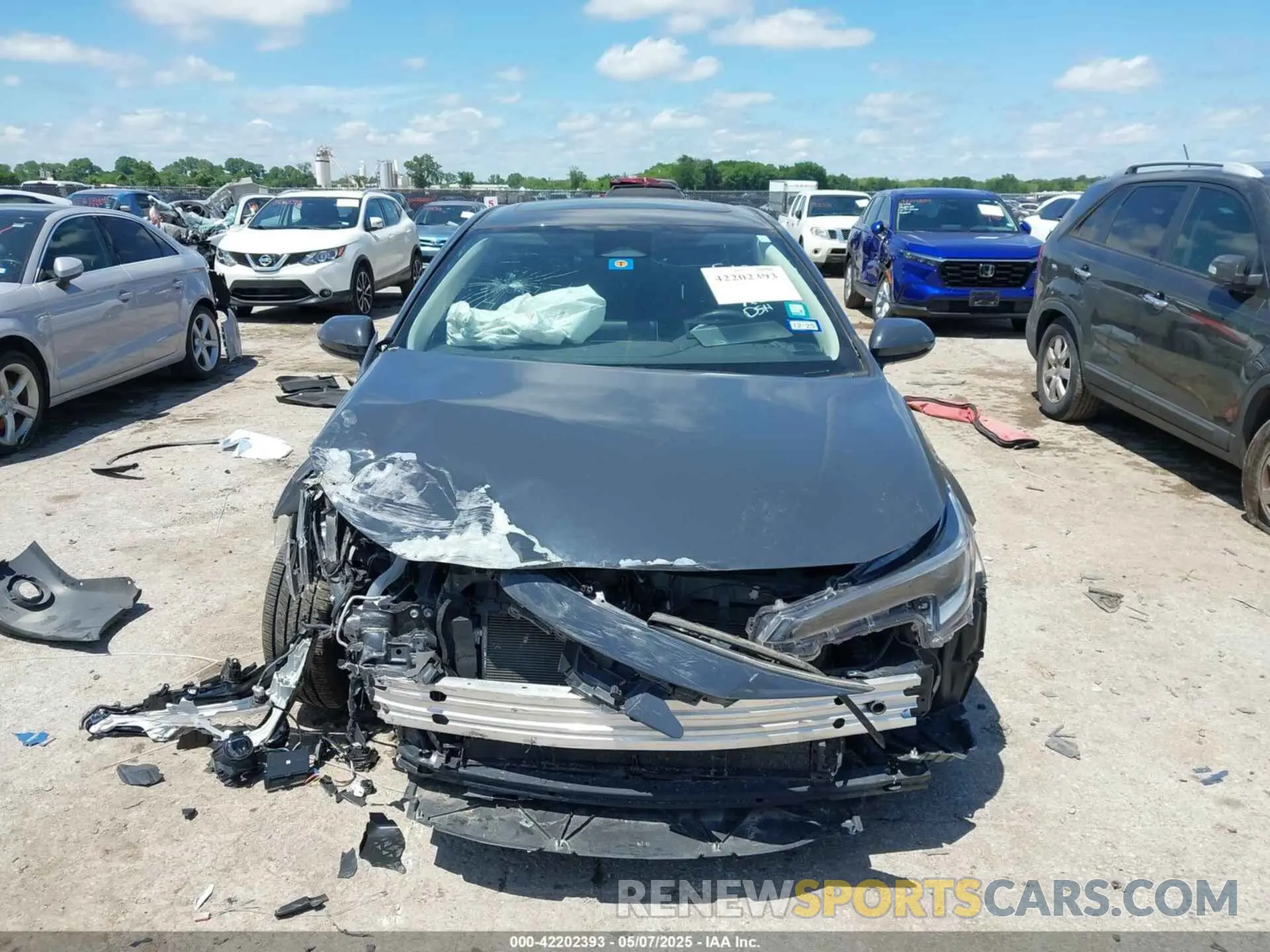 11 Photograph of a damaged car JTDBCMFE4P3003311 TOYOTA COROLLA 2023
