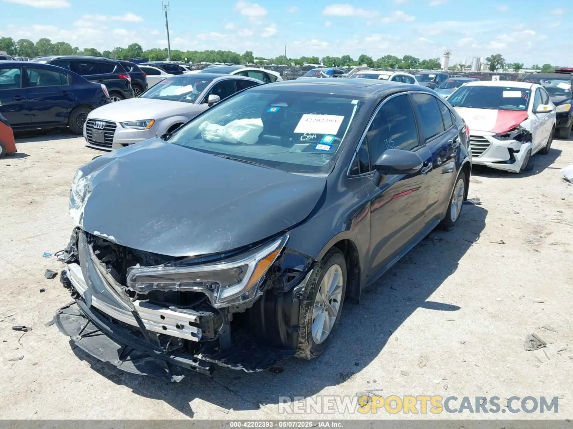 2 Photograph of a damaged car JTDBCMFE4P3003311 TOYOTA COROLLA 2023