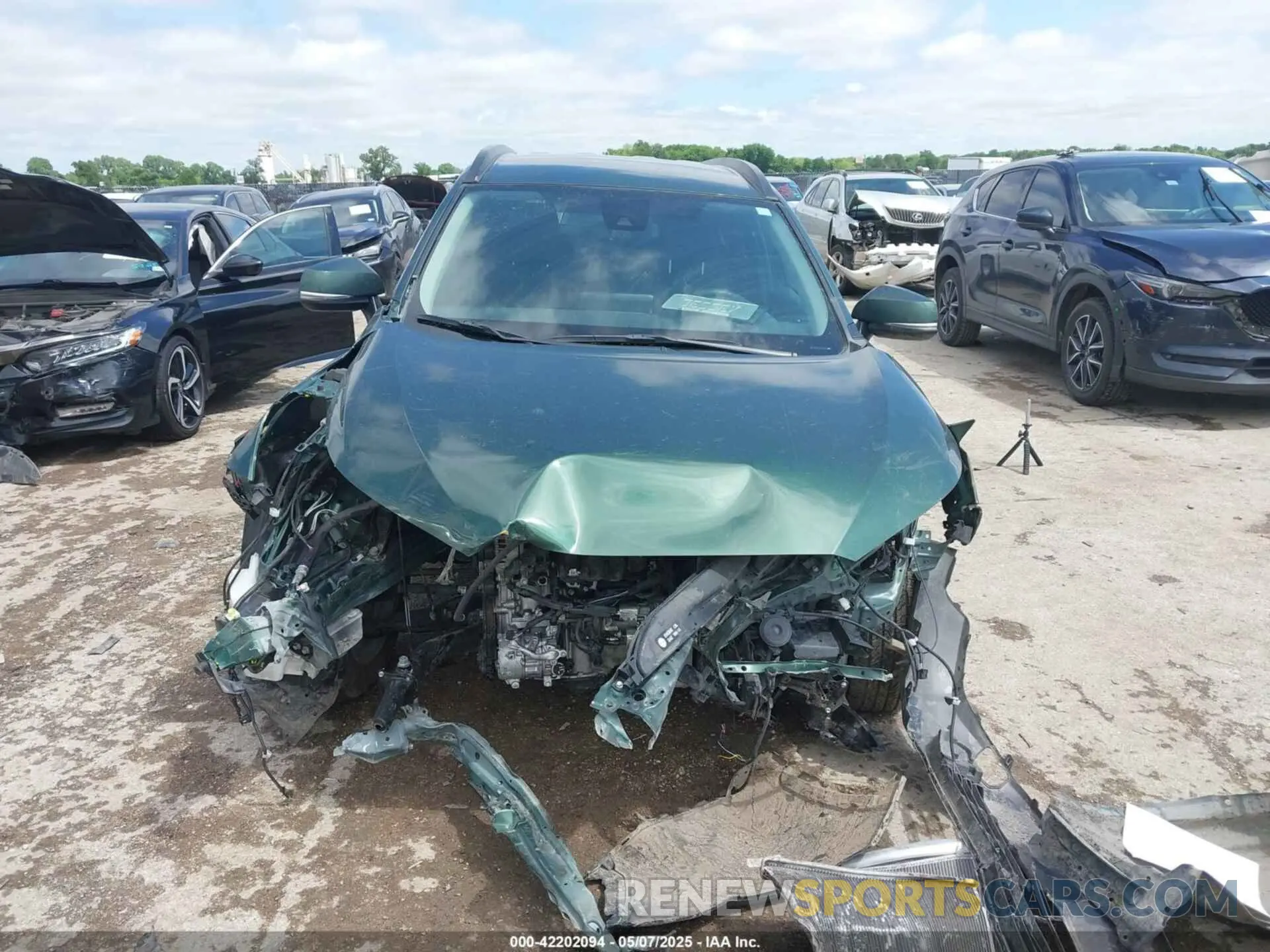 12 Фотография поврежденного автомобиля 7MUCAAAG9NV013304 TOYOTA COROLLA CROSS 2022