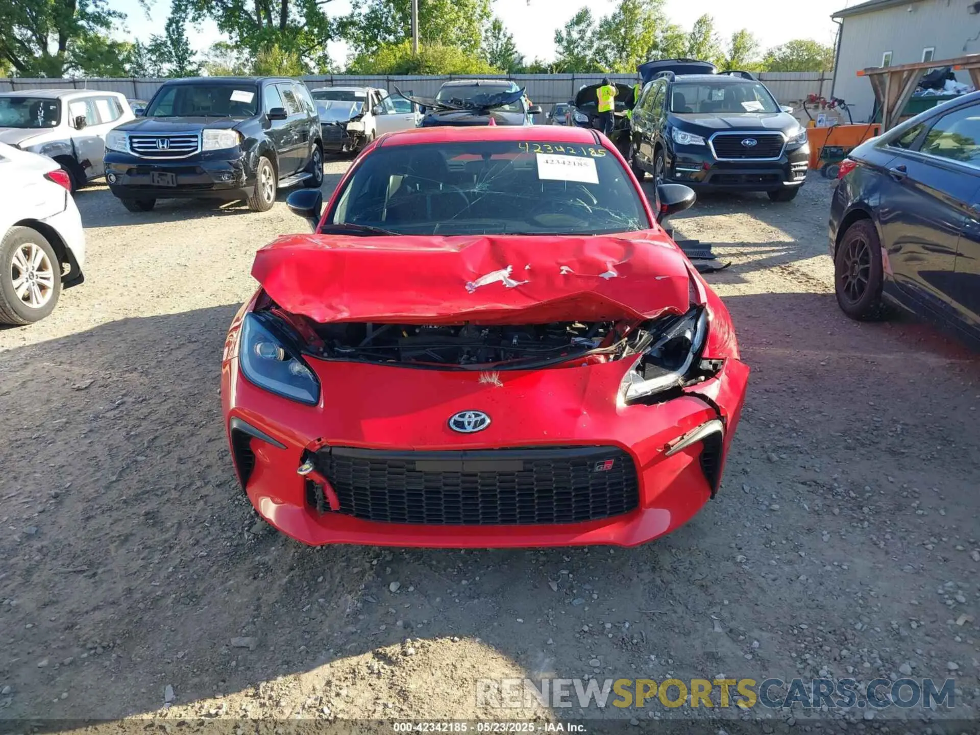 12 Photograph of a damaged car JF1ZNBE11P9760973 TOYOTA GR86 2023
