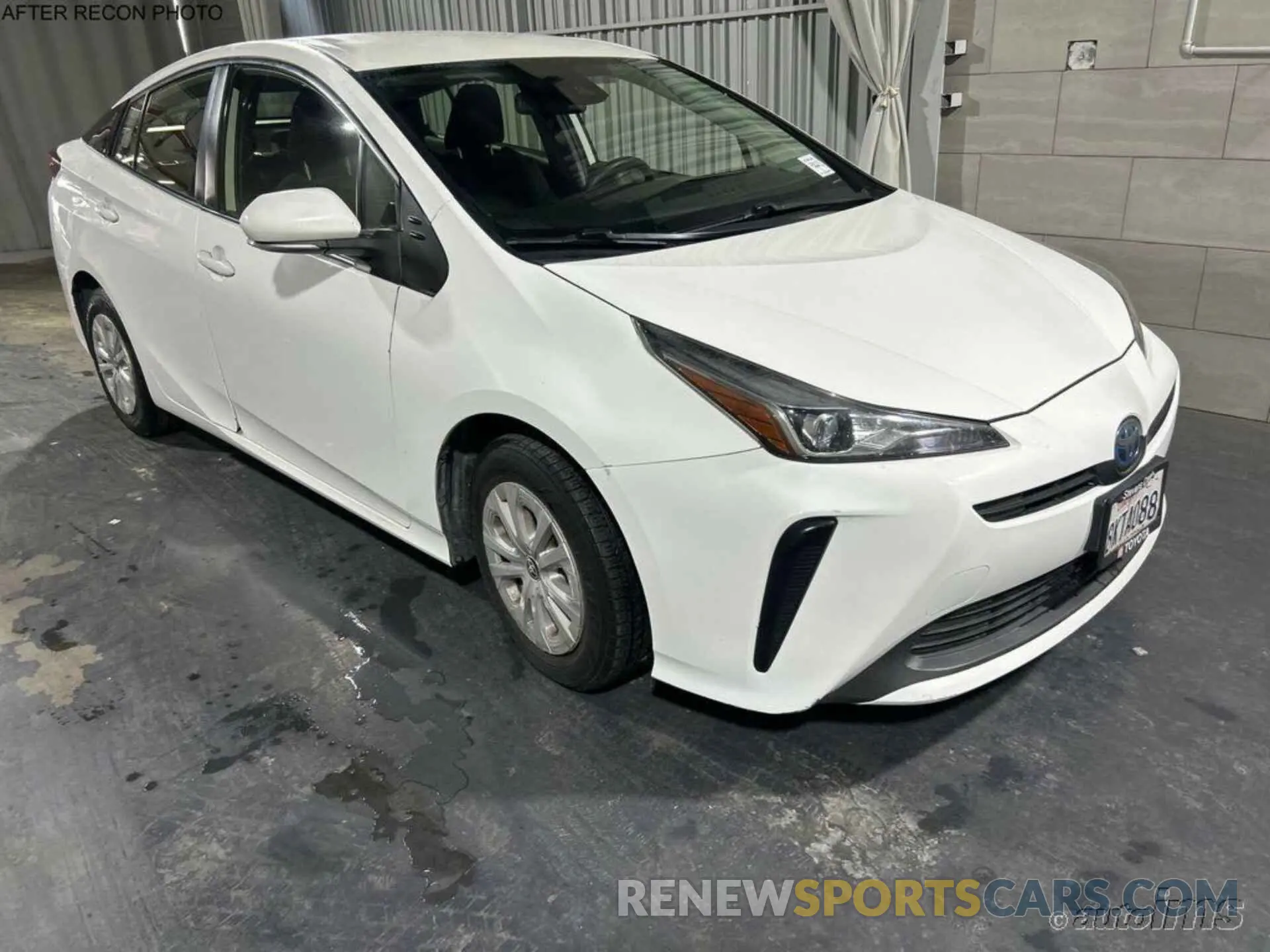 11 Photograph of a damaged car JTDKARFU7K3090074 TOYOTA PRIUS 2019