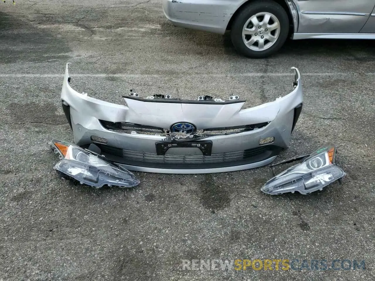12 Photograph of a damaged car JTDKARFU2L3114119 TOYOTA PRIUS 2020