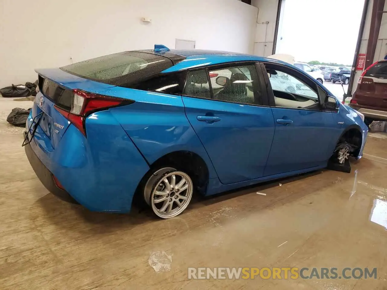 3 Photograph of a damaged car JTDKAMFU6M3142364 TOYOTA PRIUS 2021