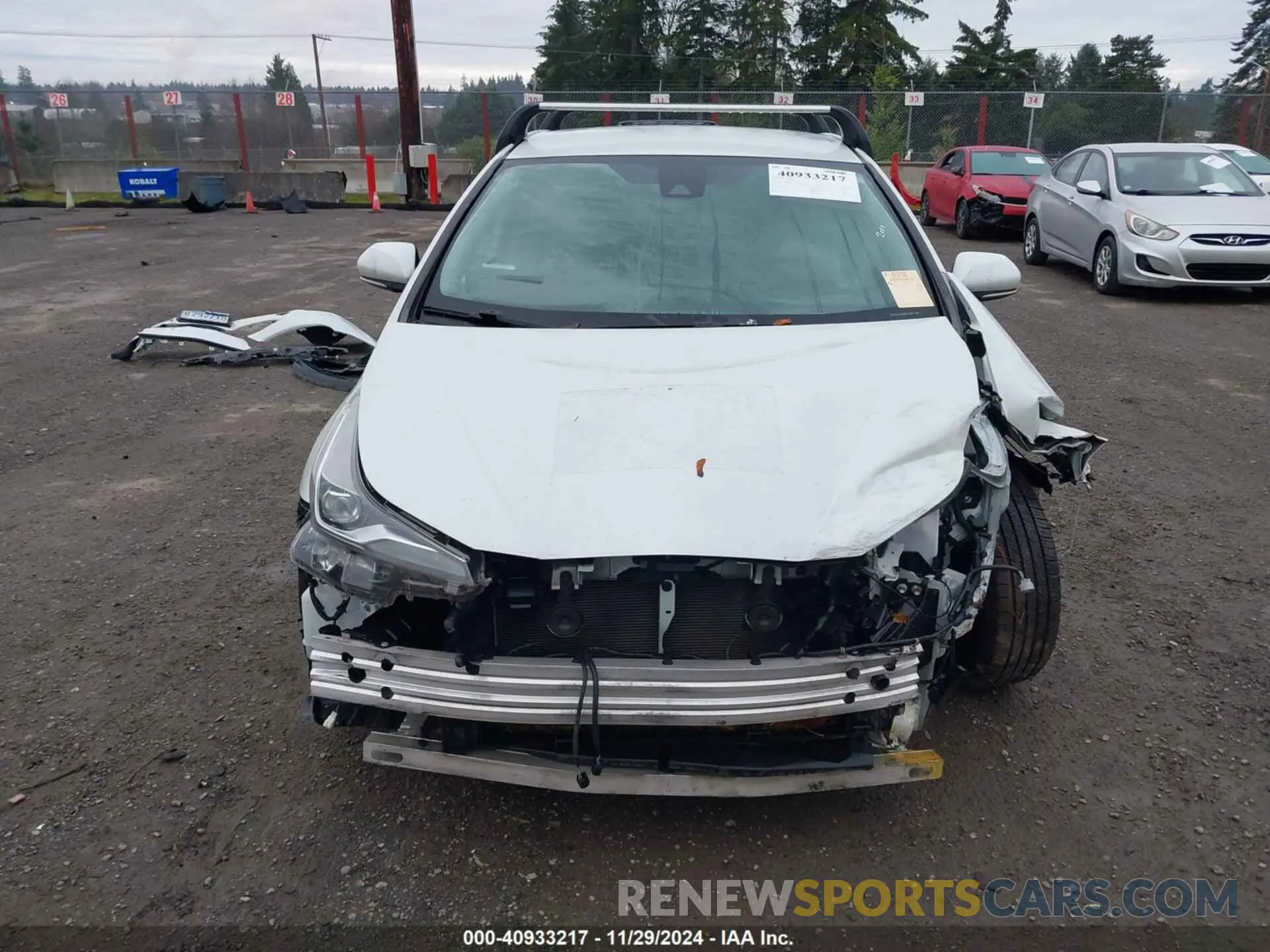12 Photograph of a damaged car JTDL9MFU9M3027383 TOYOTA PRIUS 2021