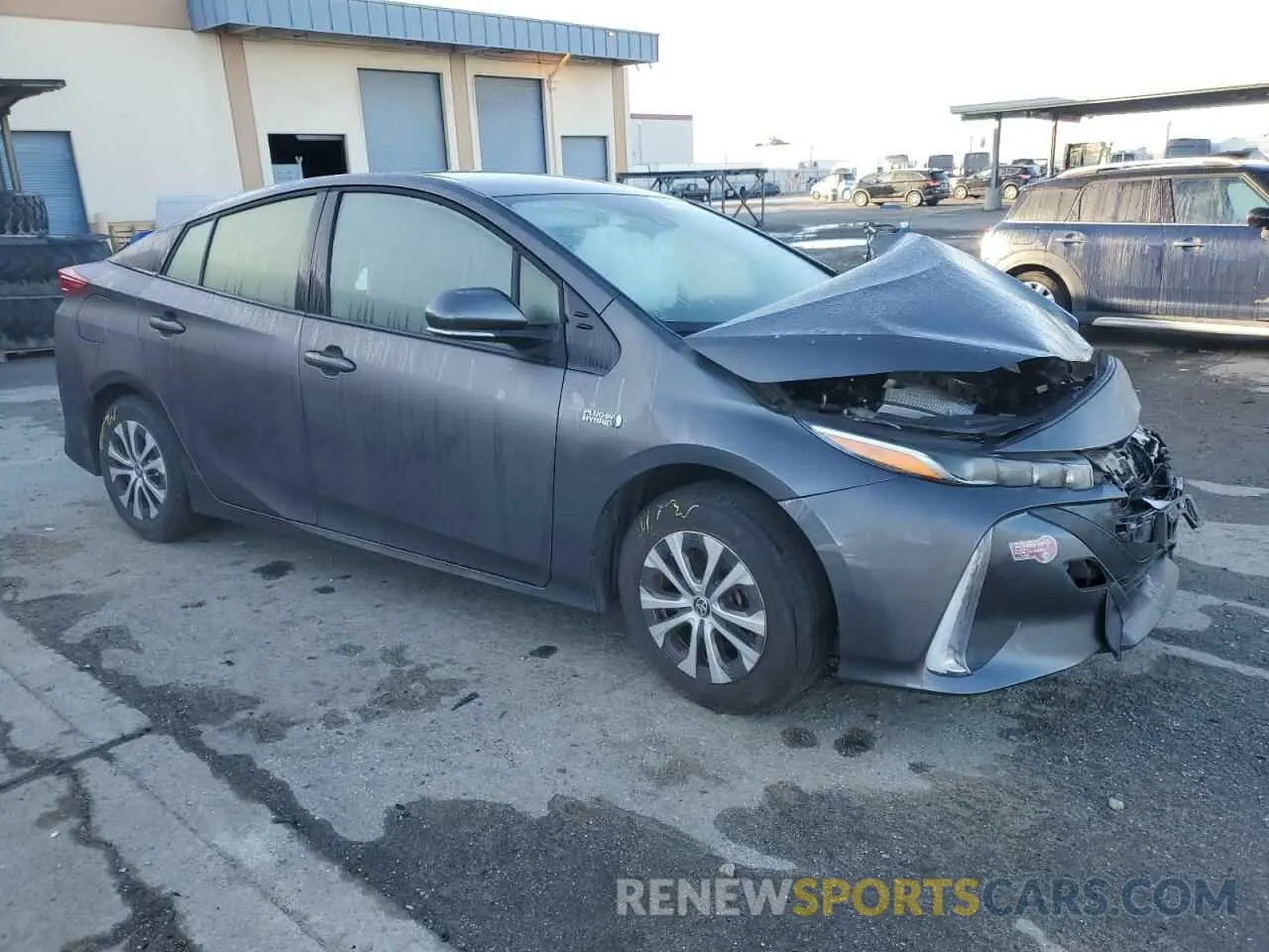 4 Photograph of a damaged car JTDKAMFP1N3197624 TOYOTA PRIUS 2022